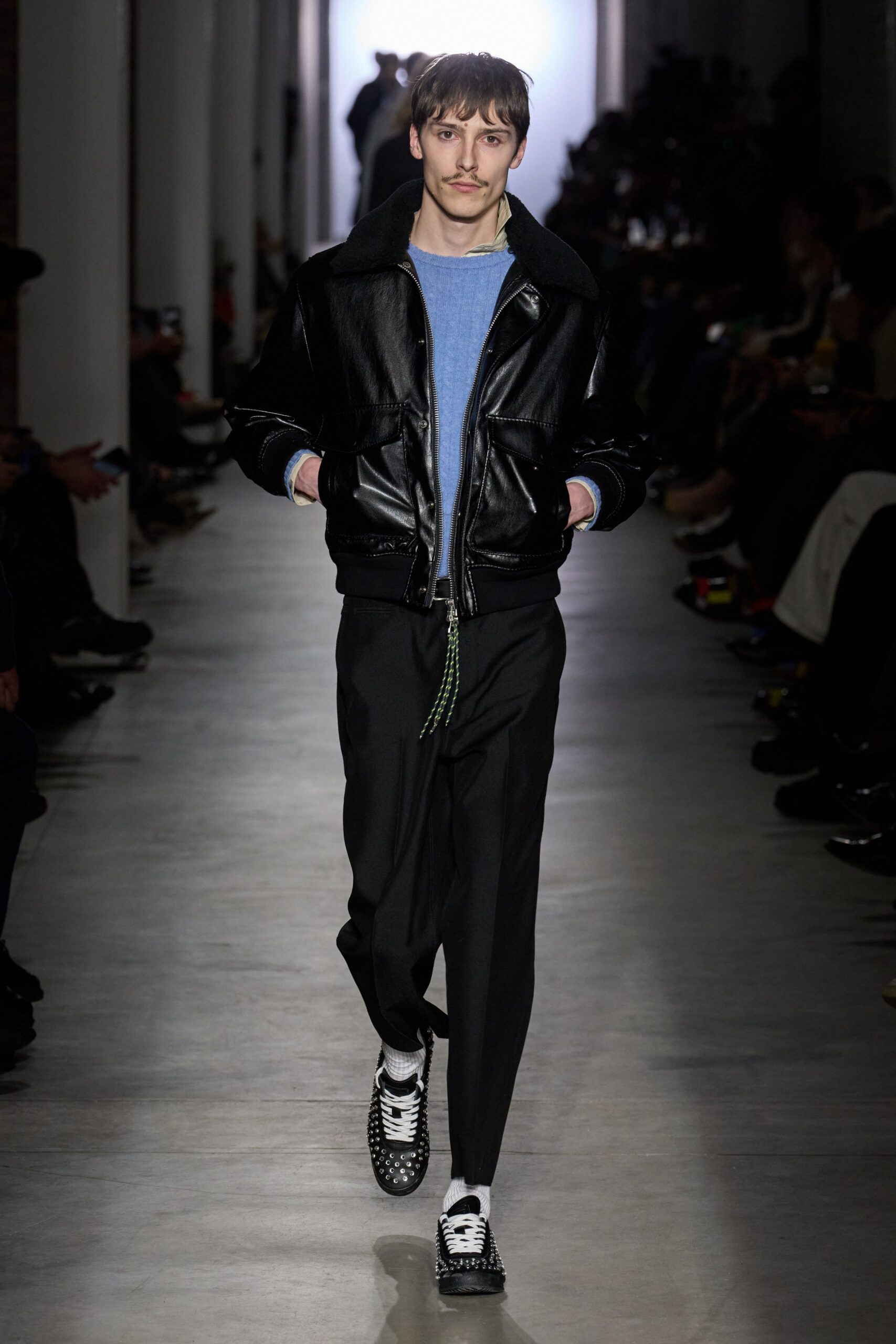 black leather jacket with blue top