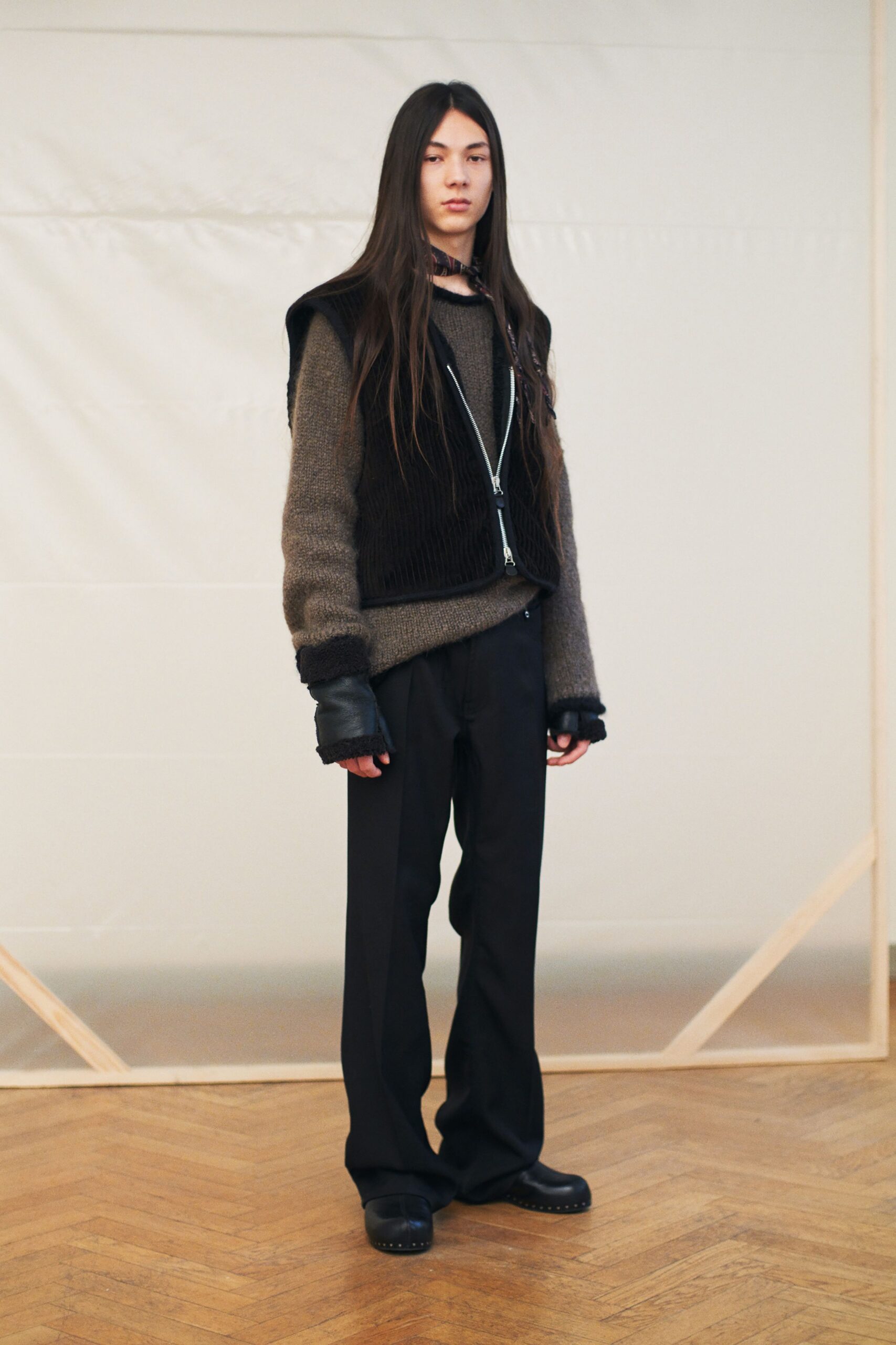 brown wool sweater with black vest