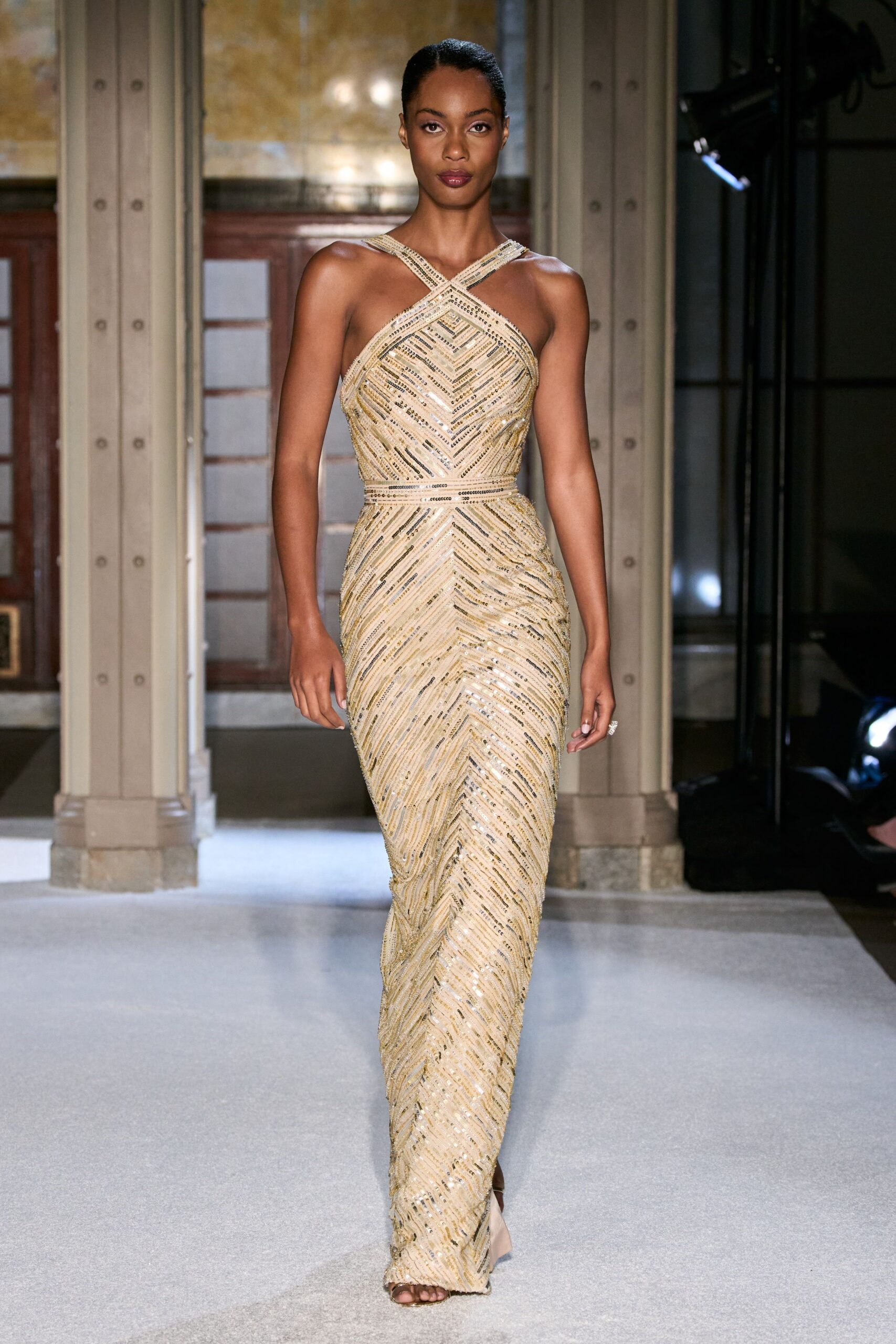 gold beaded sleeveless gown