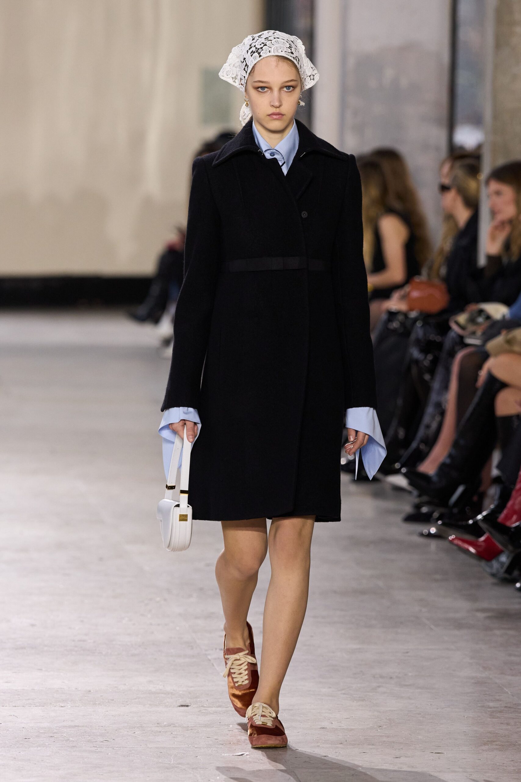 black wool coat with blue shirt