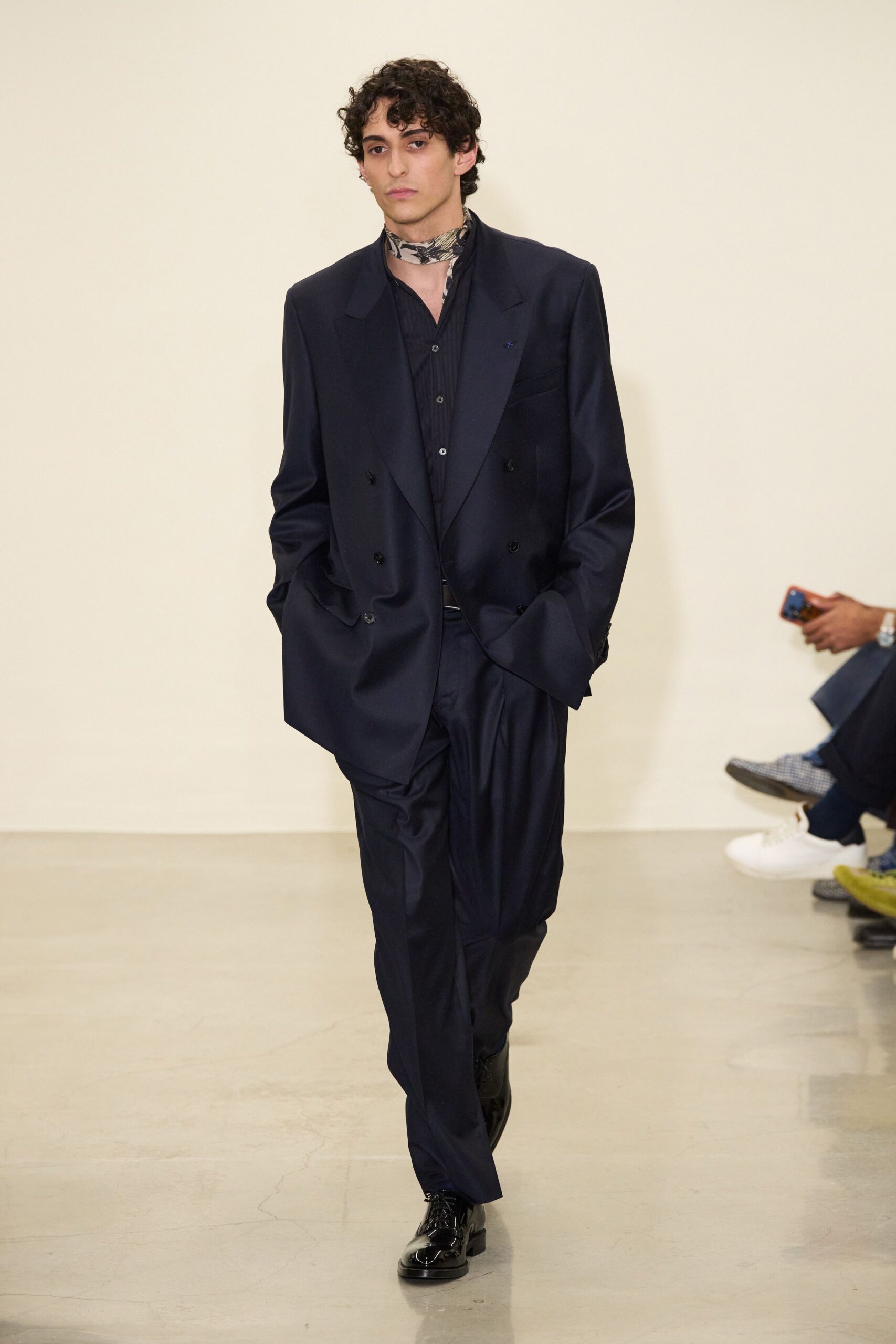 black tailored suit with scarf
