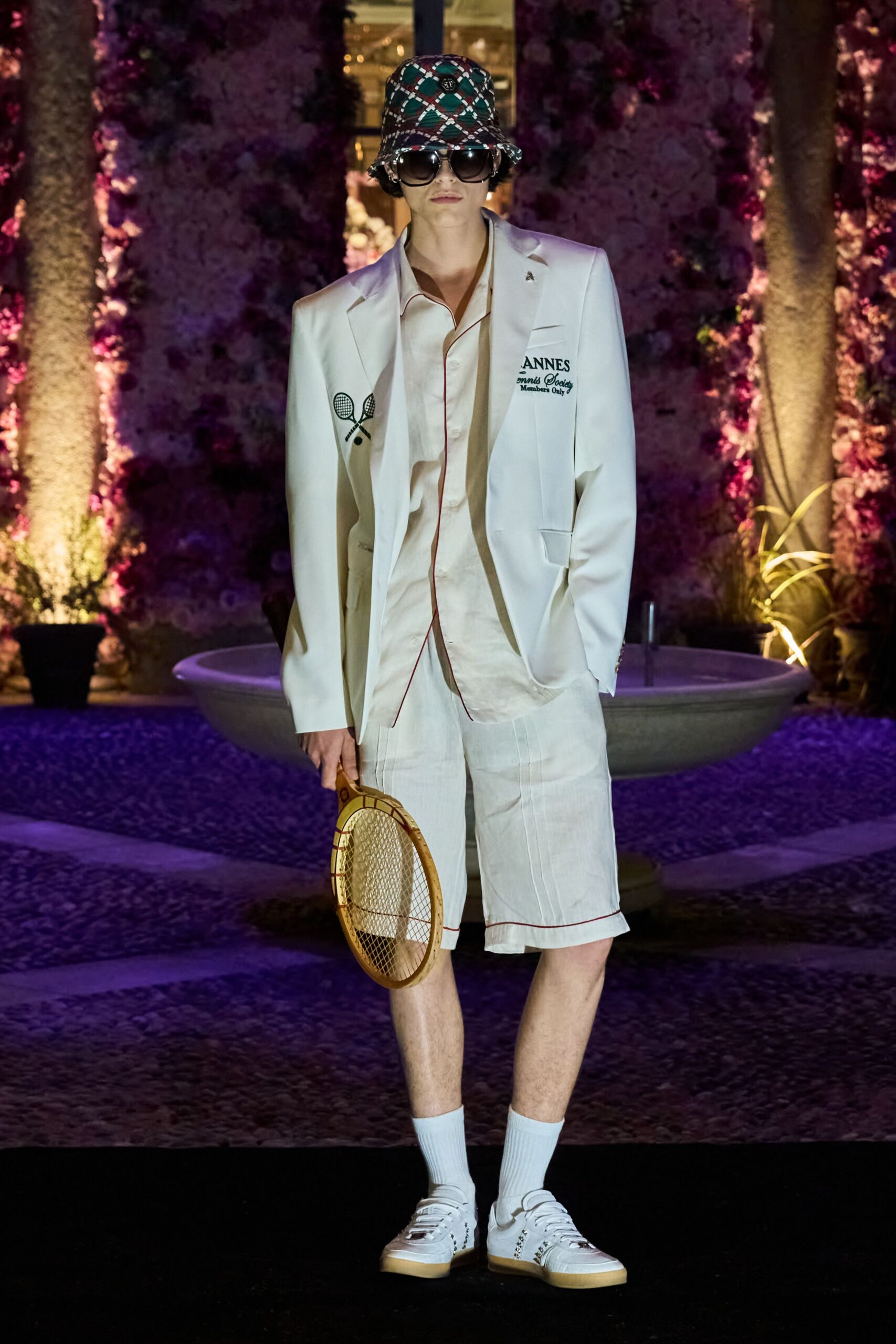 white tailored blazer with beige shorts