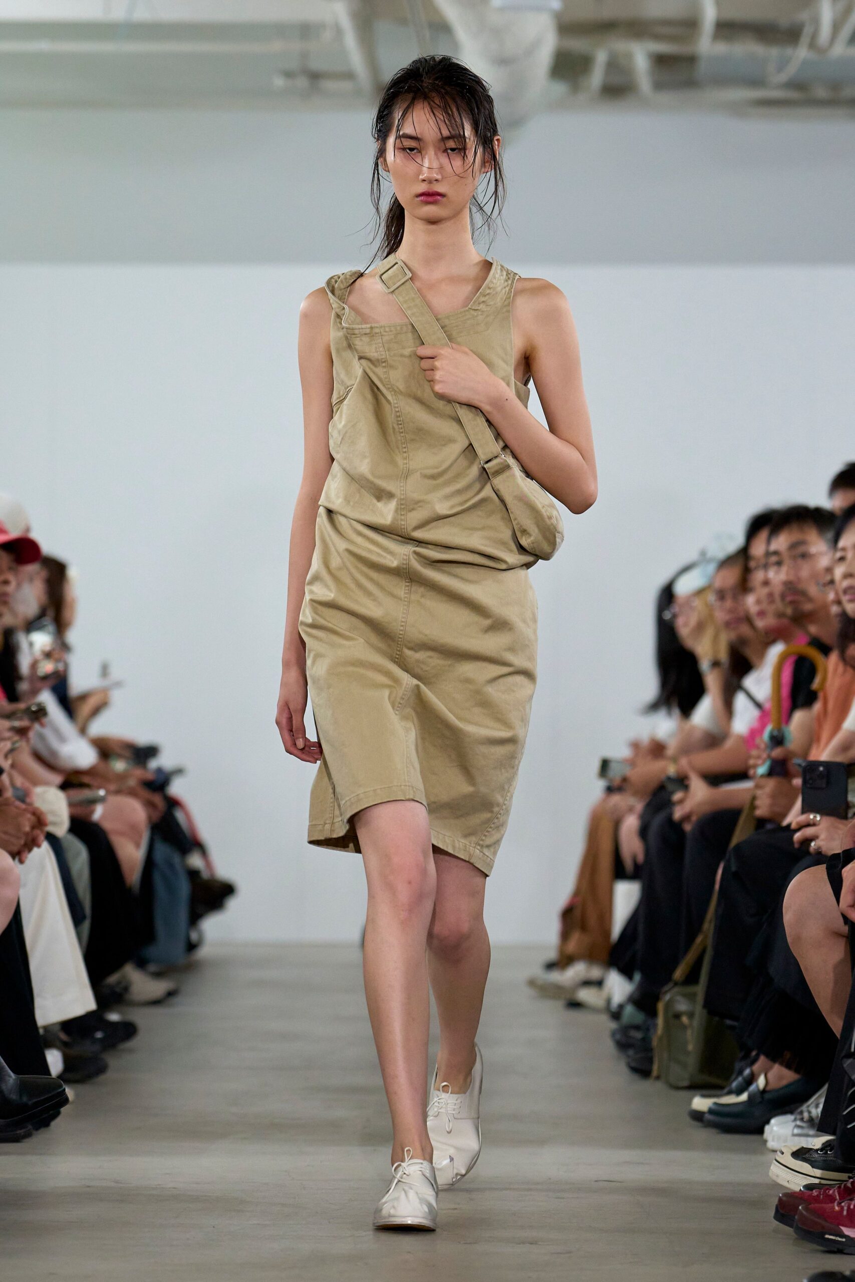 beige sleeveless mini dress with white shoes