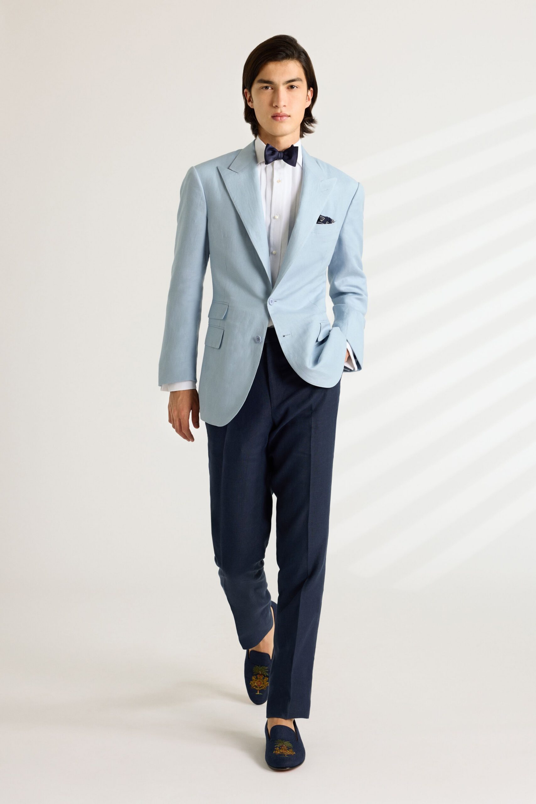 light blue tailored blazer with navy pants