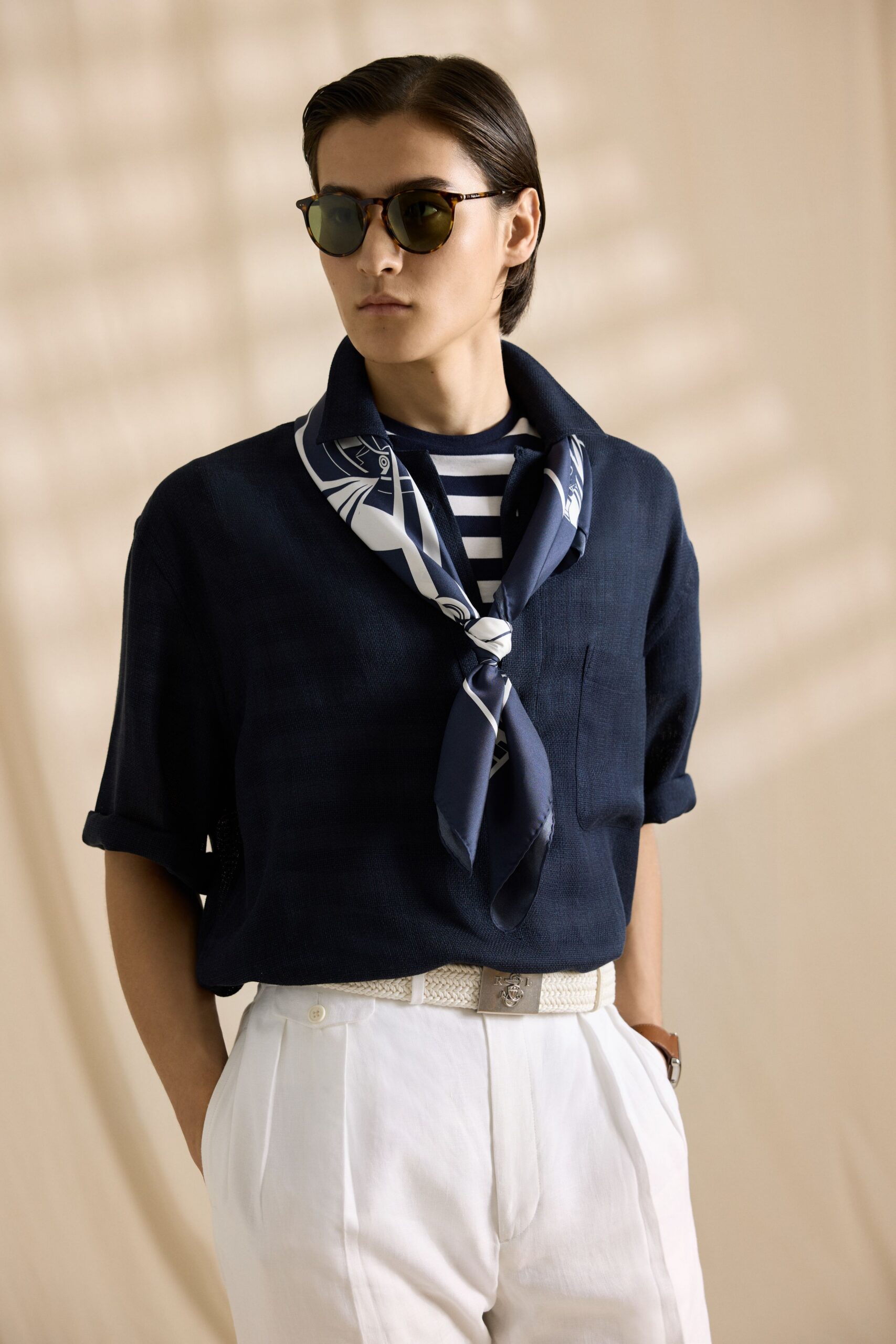 navy shirt with white pants