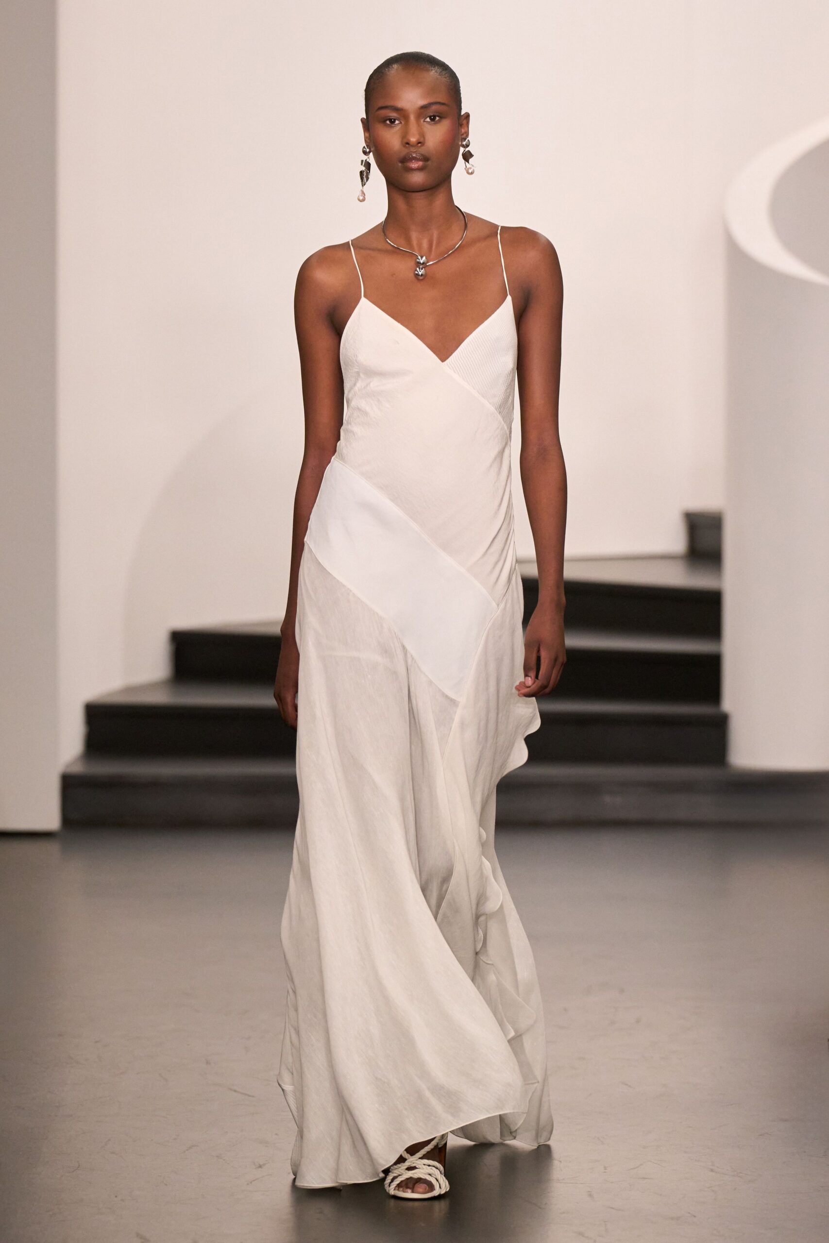 white silk sleeveless gown