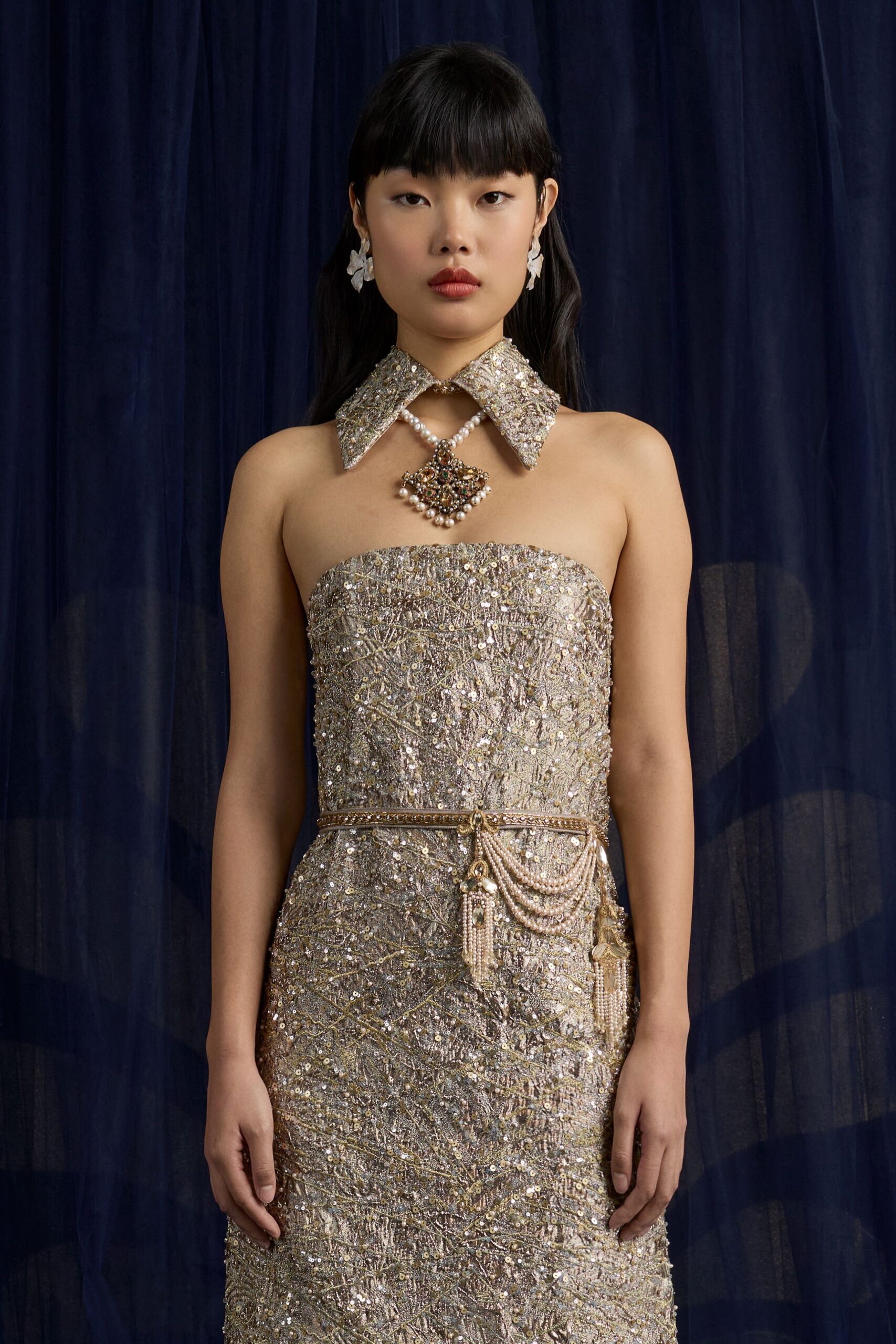 gold beaded strapless gown
