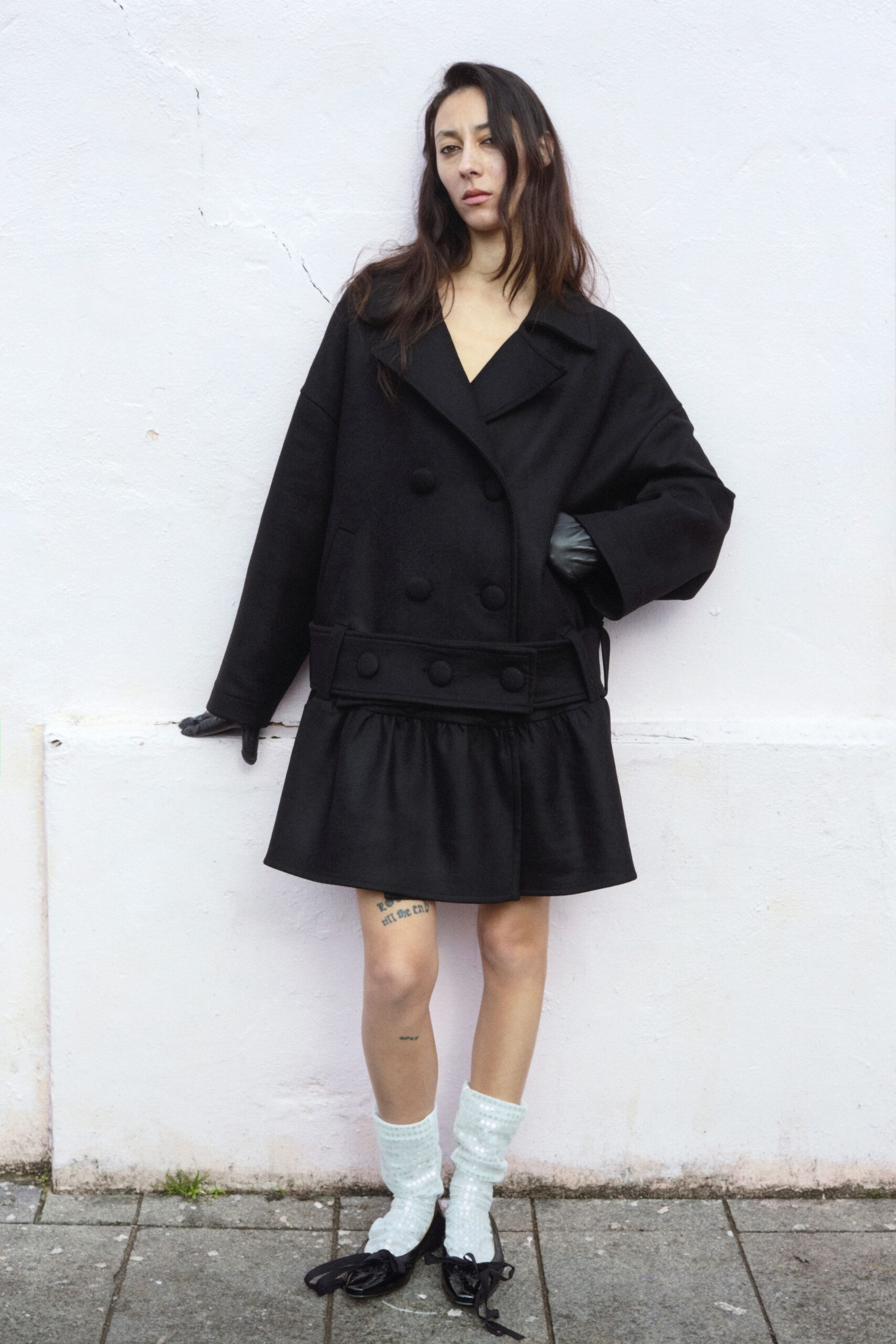black oversized coat with mini dress