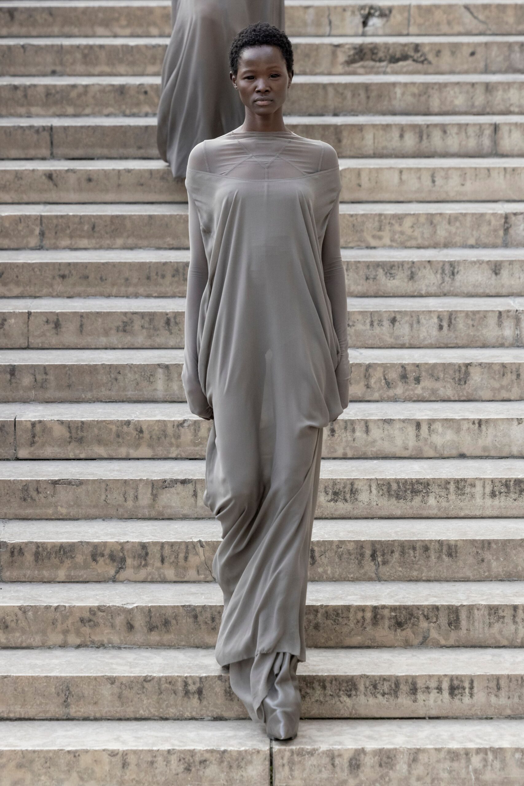gray silk long-sleeve high-neck relaxed draped flowing gown