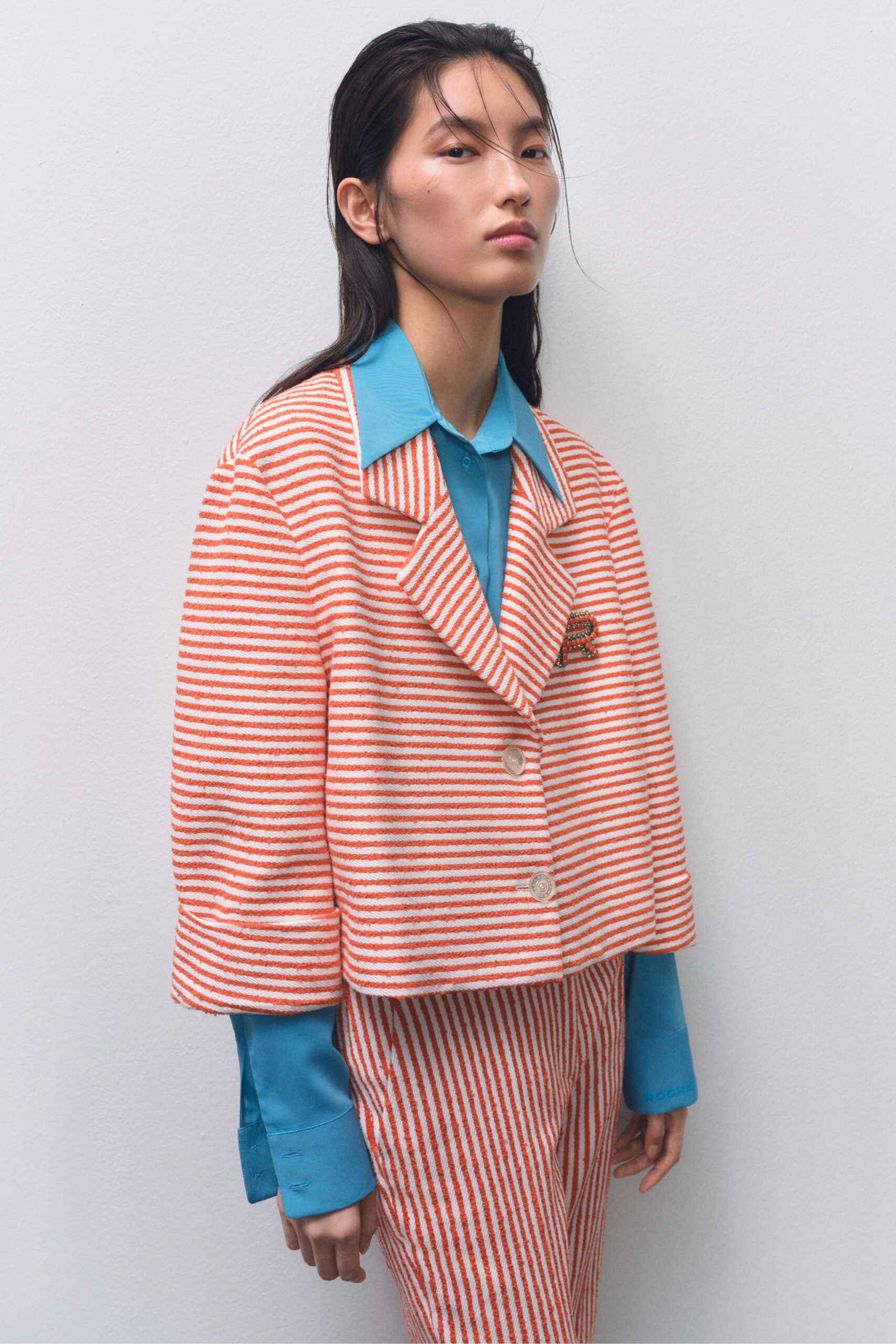 striped orange and blue outfit