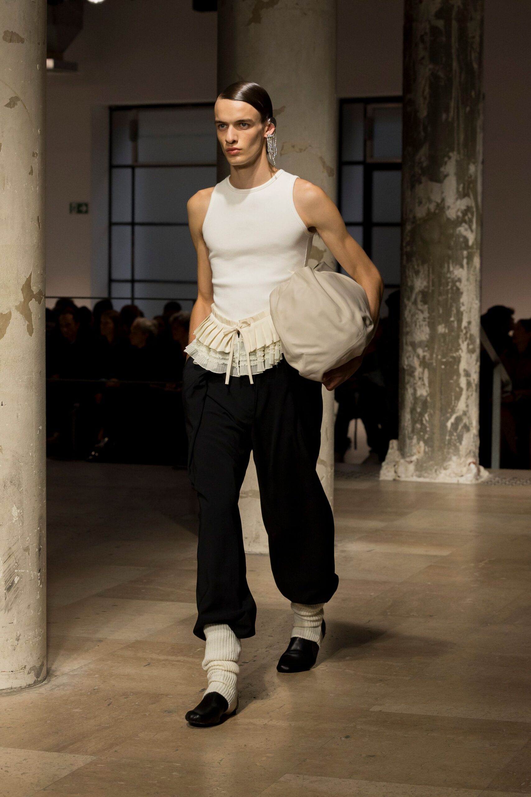 white fitted top black pants