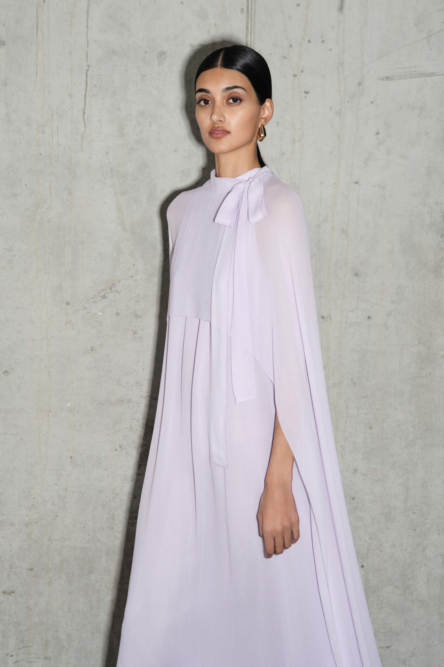 lavender flowing sleeveless gown