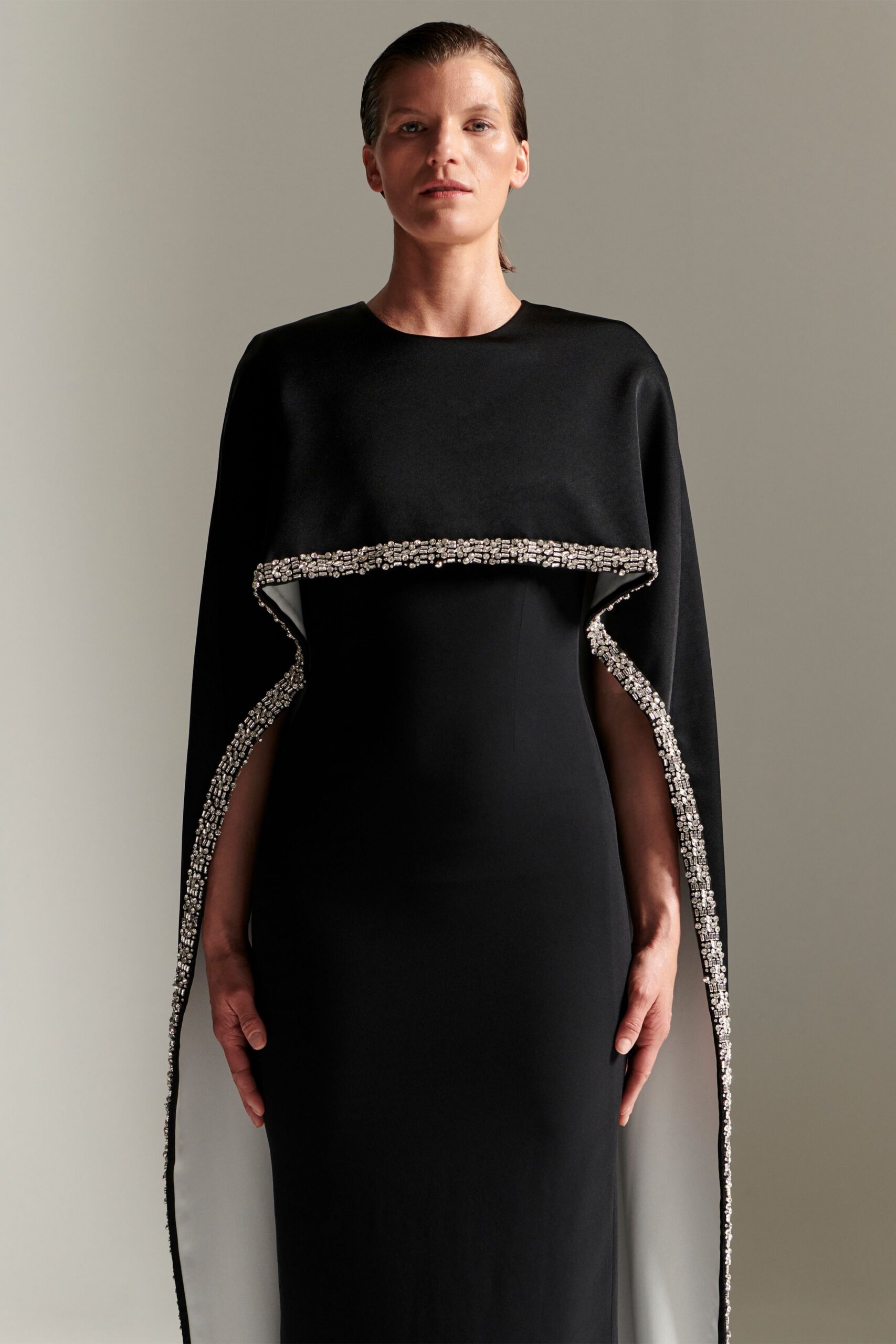 black silk gown with cape