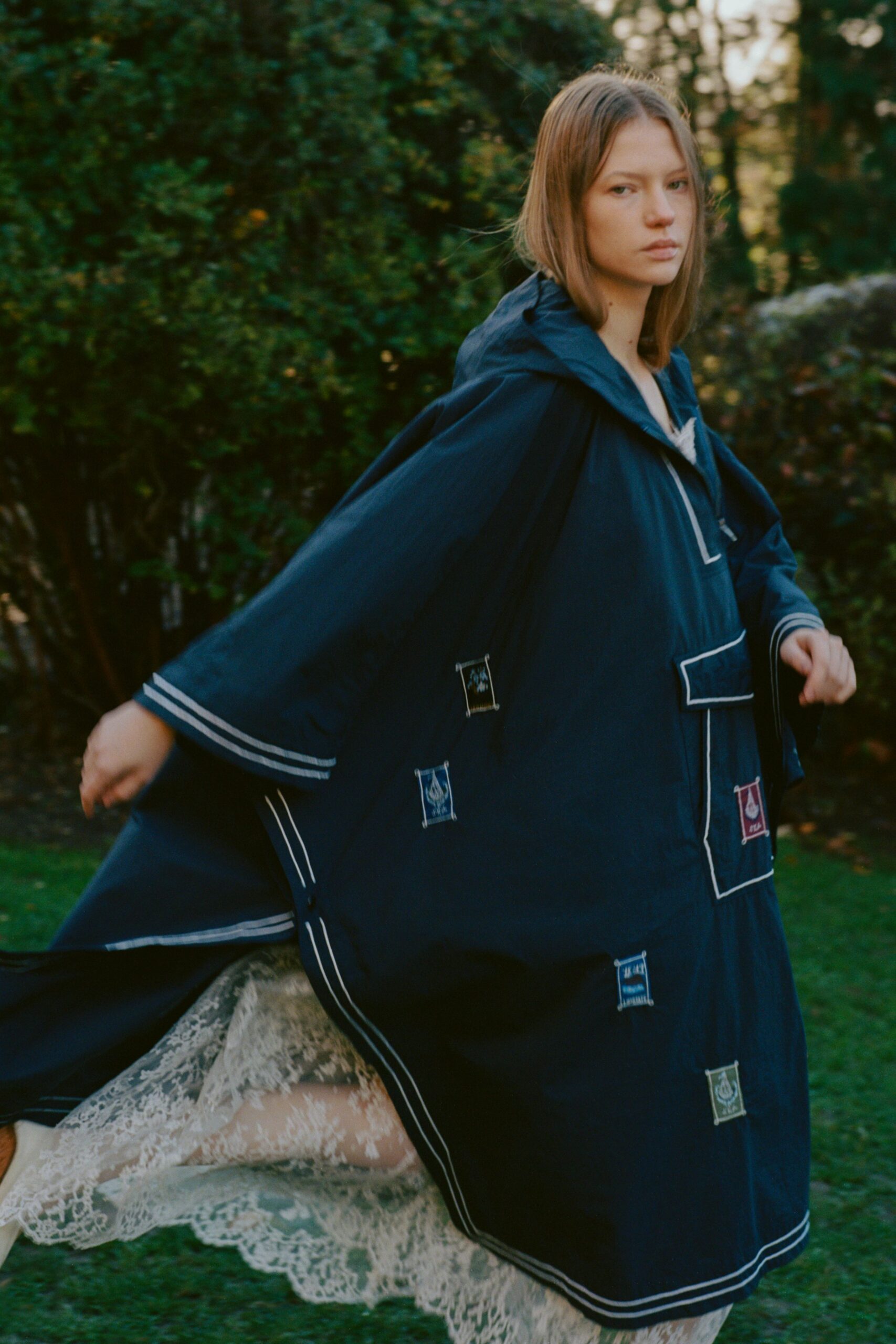 black cotton long-sleeve hooded relaxed embroidered poncho