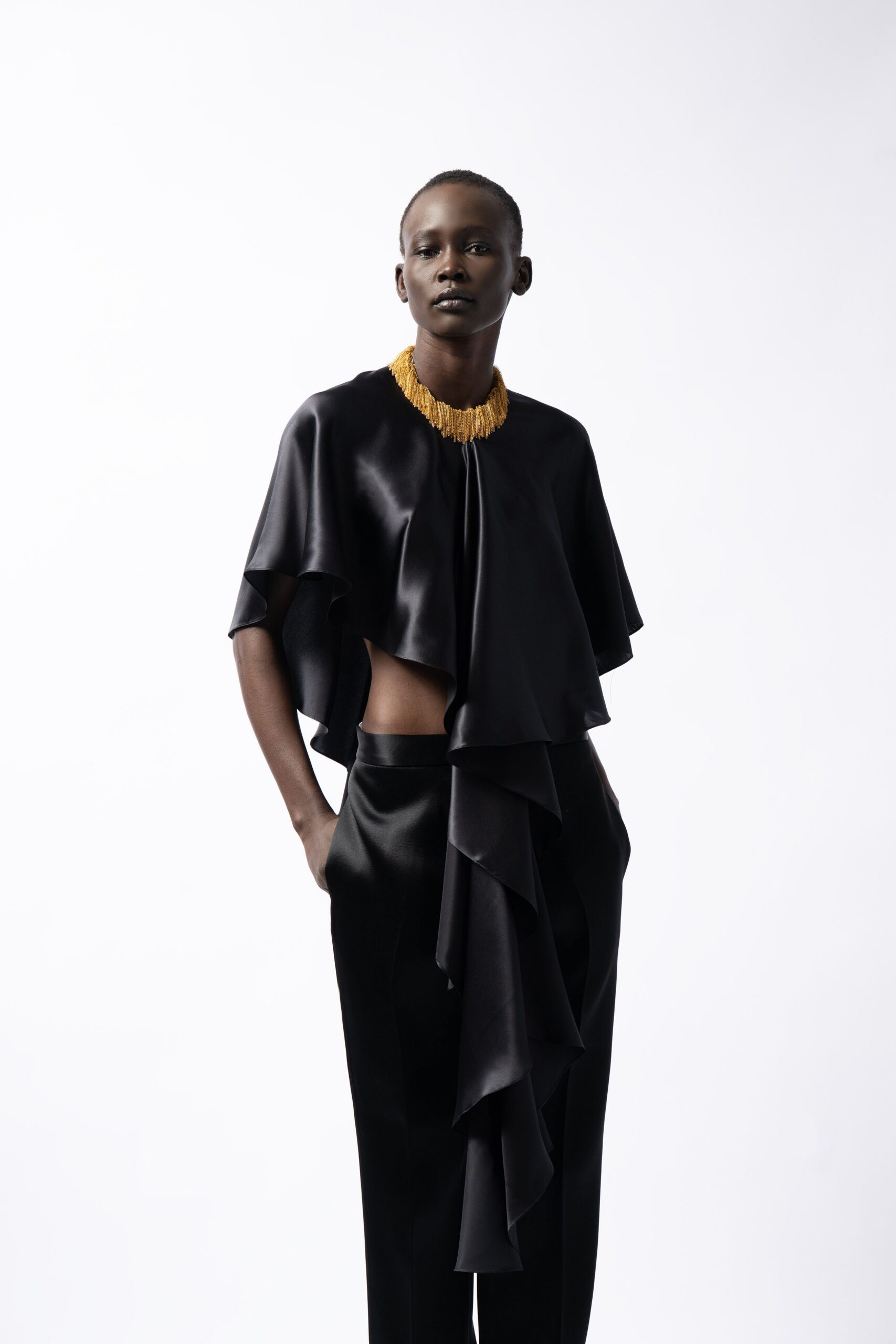 black silk short-sleeve high-neck fitted ruffled flowing top