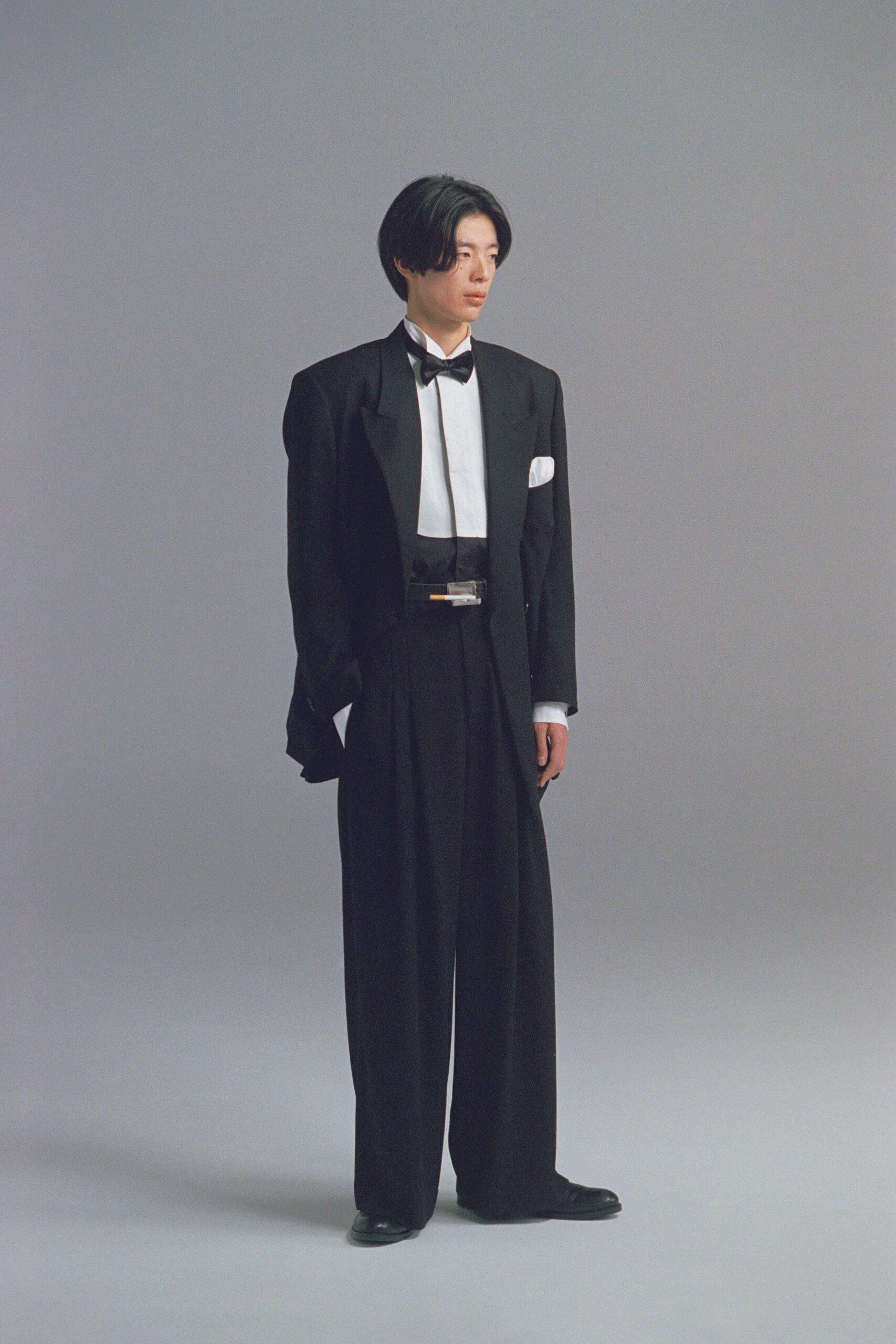 black wool long-sleeve collared oversized buttoned blazer