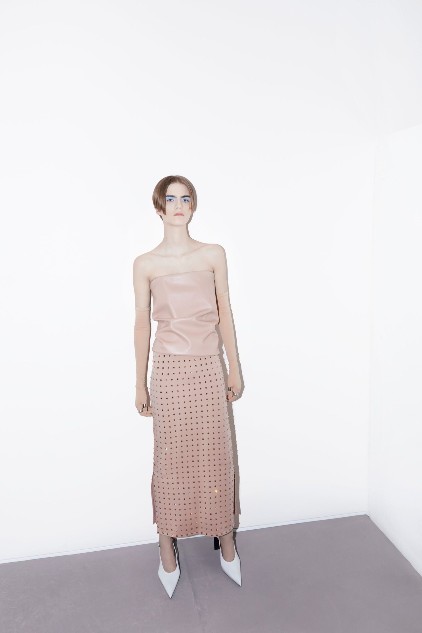 beige leather fitted pleated midi skirt