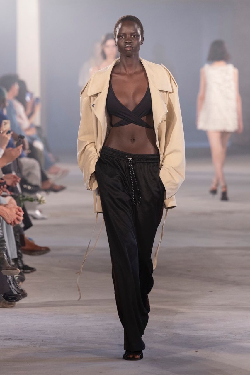 beige oversized coat with black top