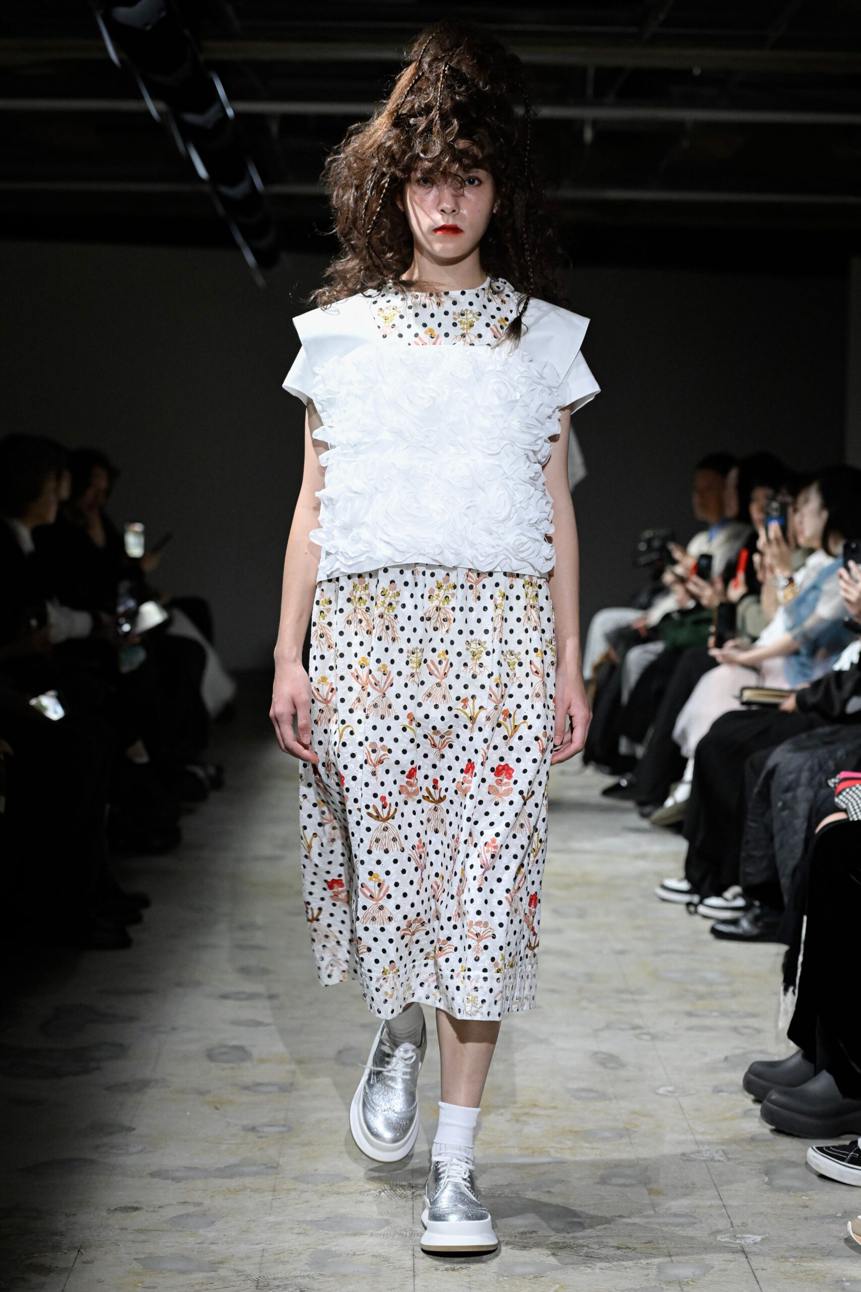 white multi-colored midi dress with silver shoes