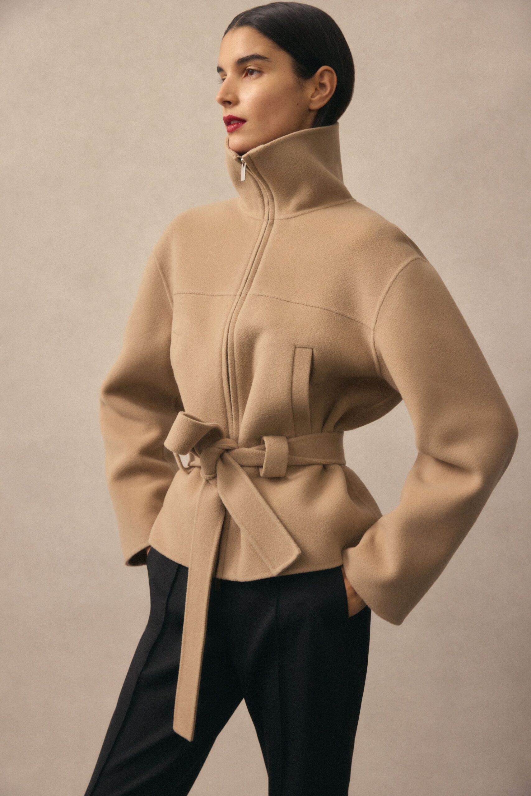 beige wool long-sleeve collared fitted zippered belted jacket