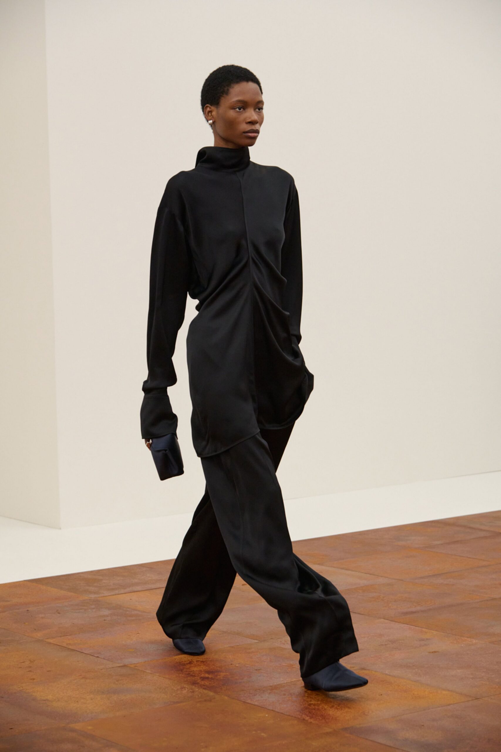 black silk long-sleeve high-neck relaxed draped jumpsuit
