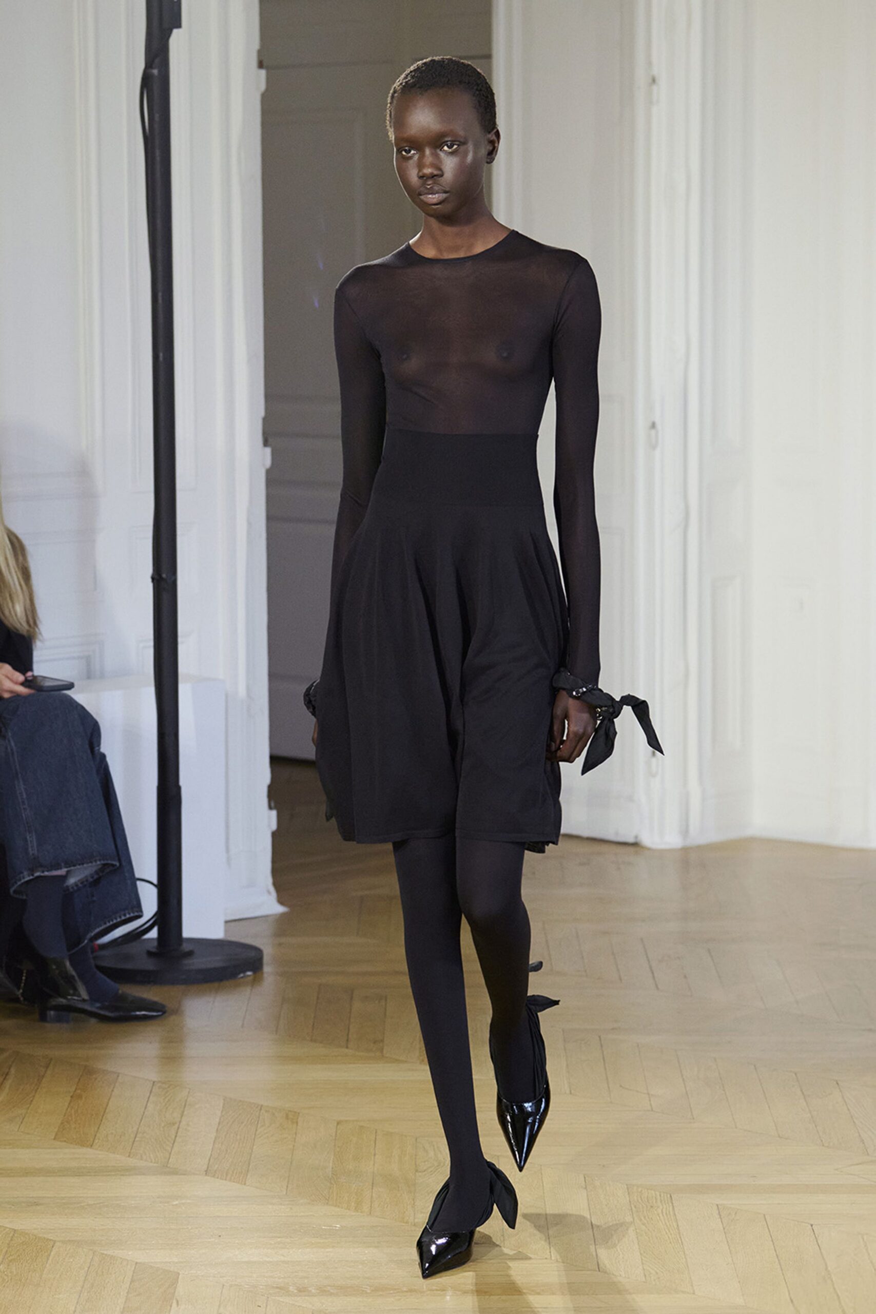 black sheer midi dress with pointed shoes