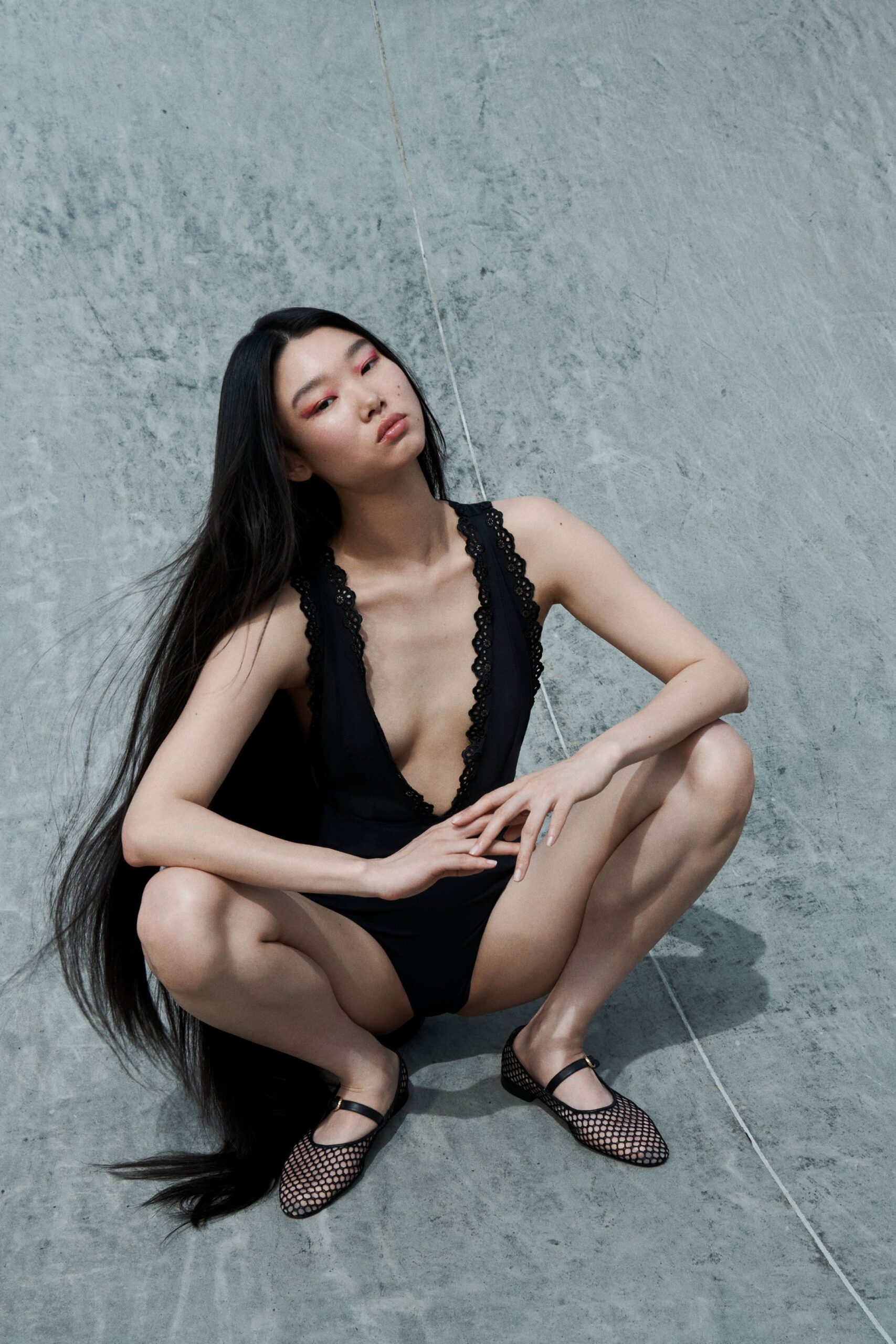 black cotton sleeveless v-neck fitted embroidered bodysuit