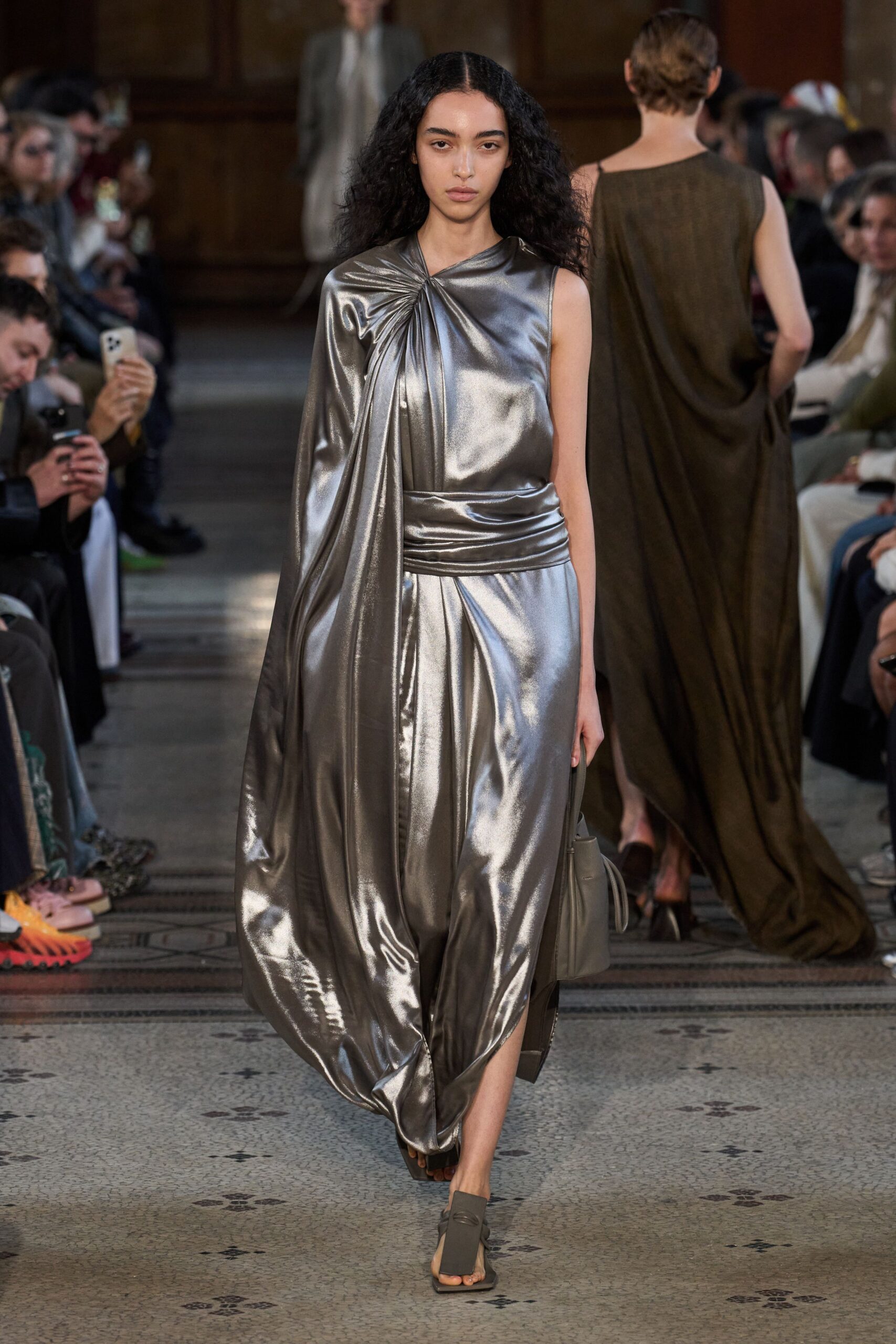 gray metallic asymmetric off-shoulder draped shiny flowing gown