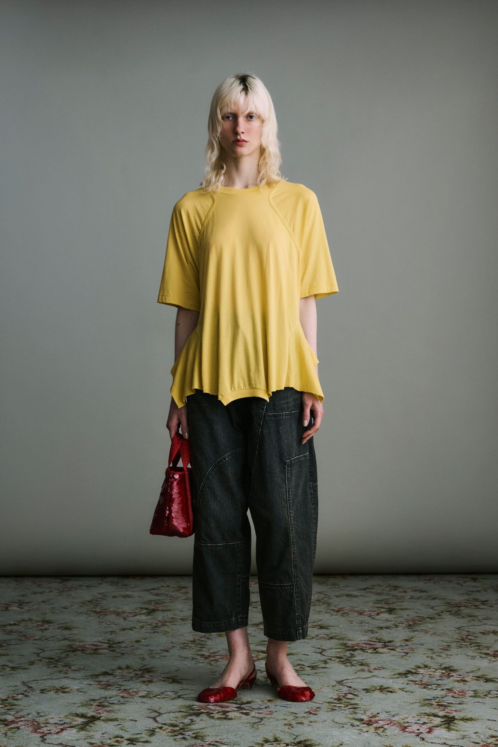 yellow relaxed top with denim pants