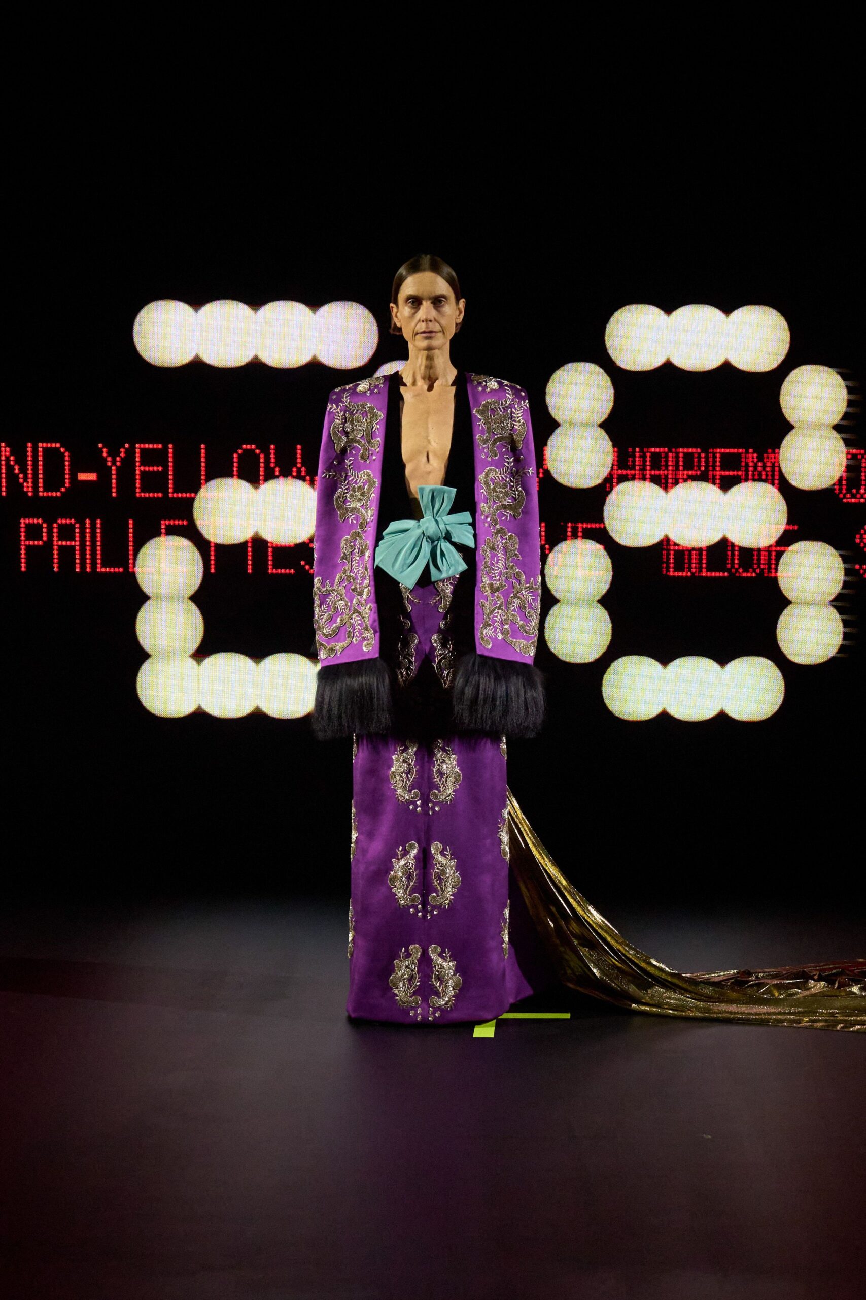purple silk sleeveless v-neck fitted embroidered draped gown