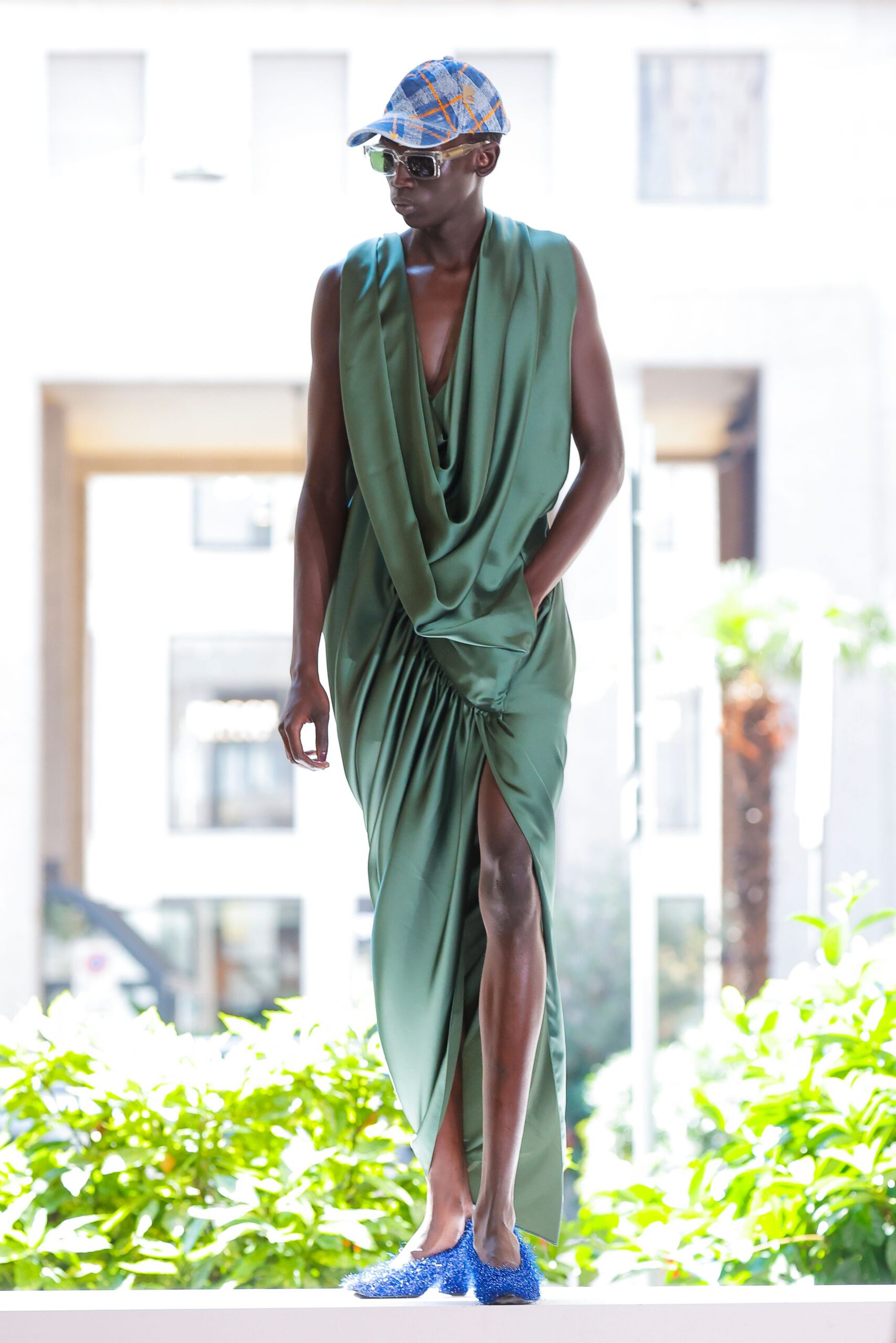 green silk sleeveless v-neck fitted draped pleated dress