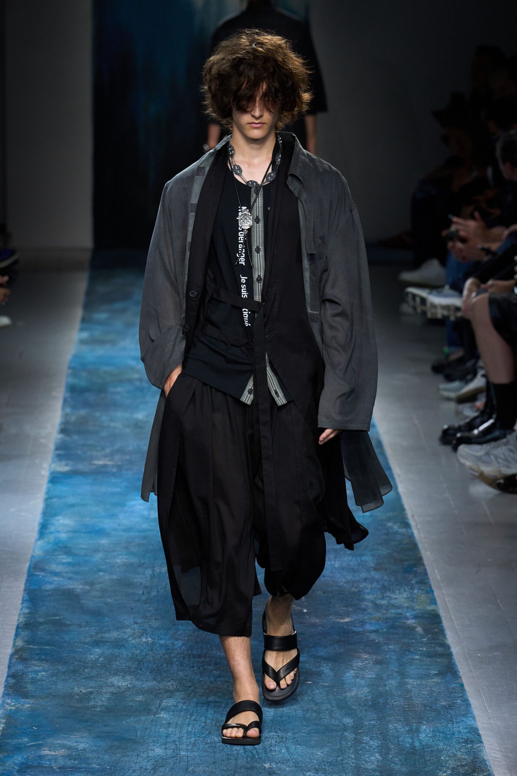 gray coat black shirt relaxed pants