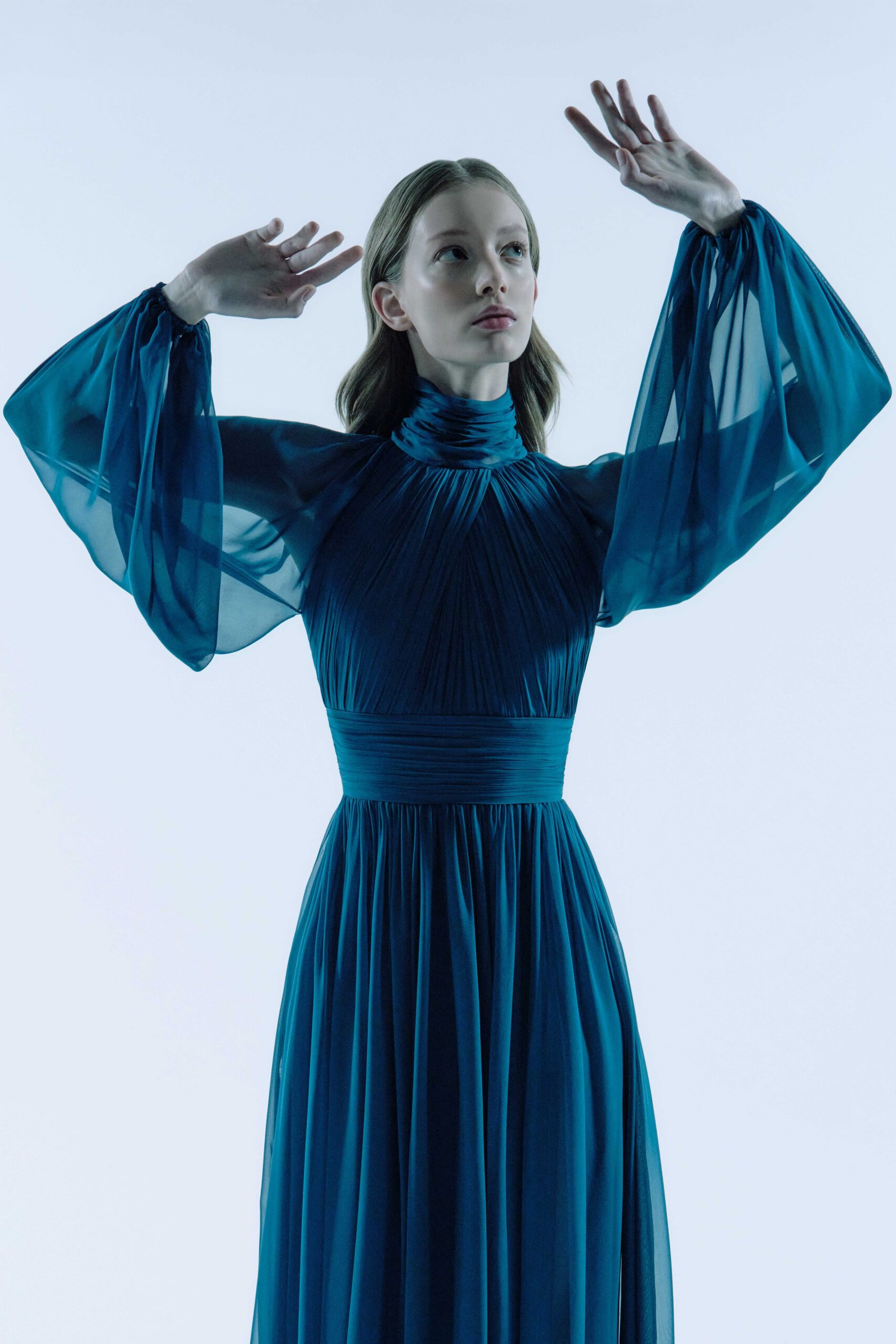 blue chiffon long-sleeve gown