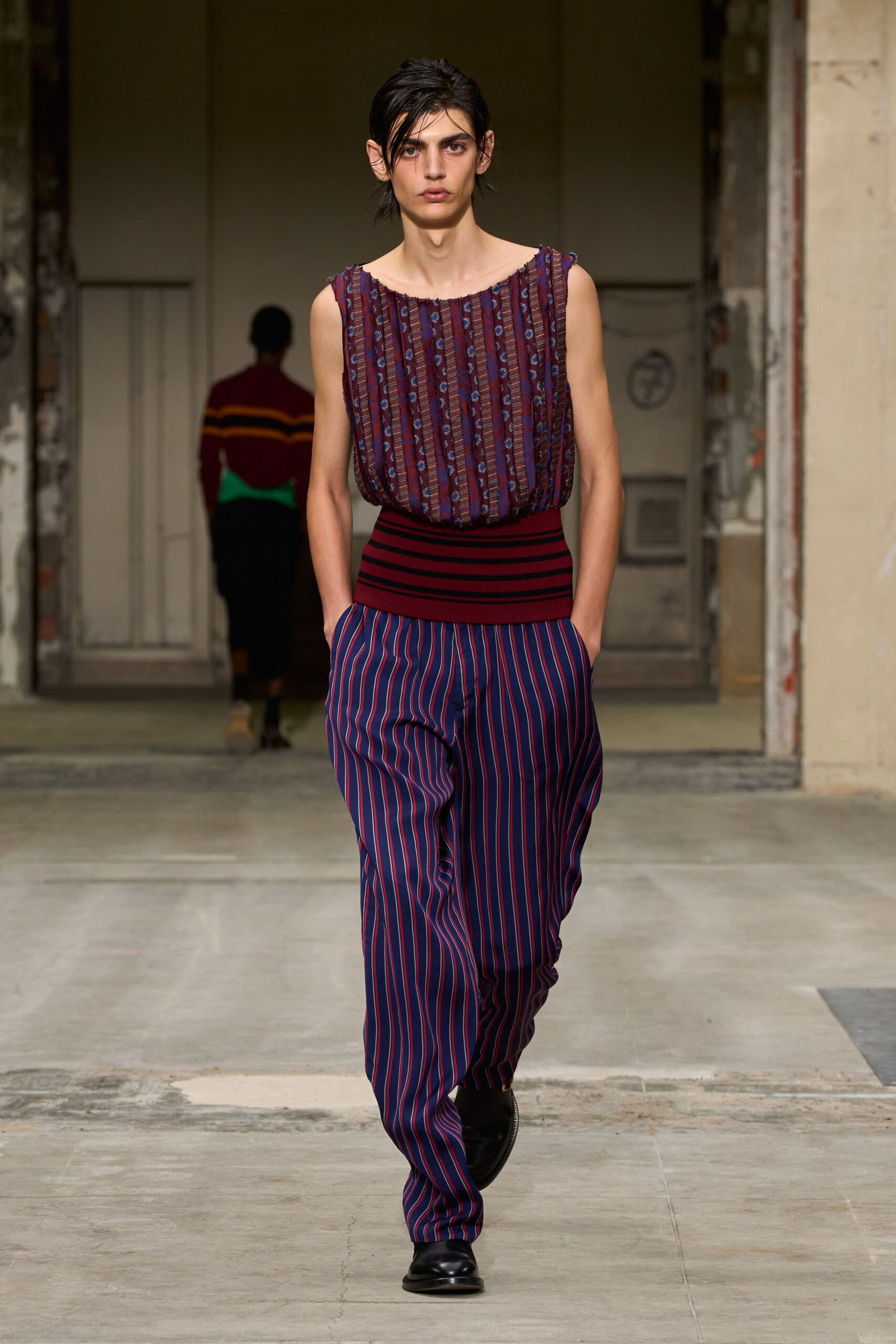 red purple embroidered top with striped pants