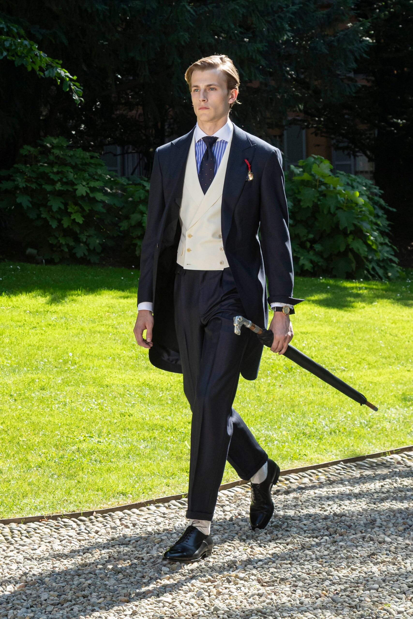 navy tailored suit with cream vest