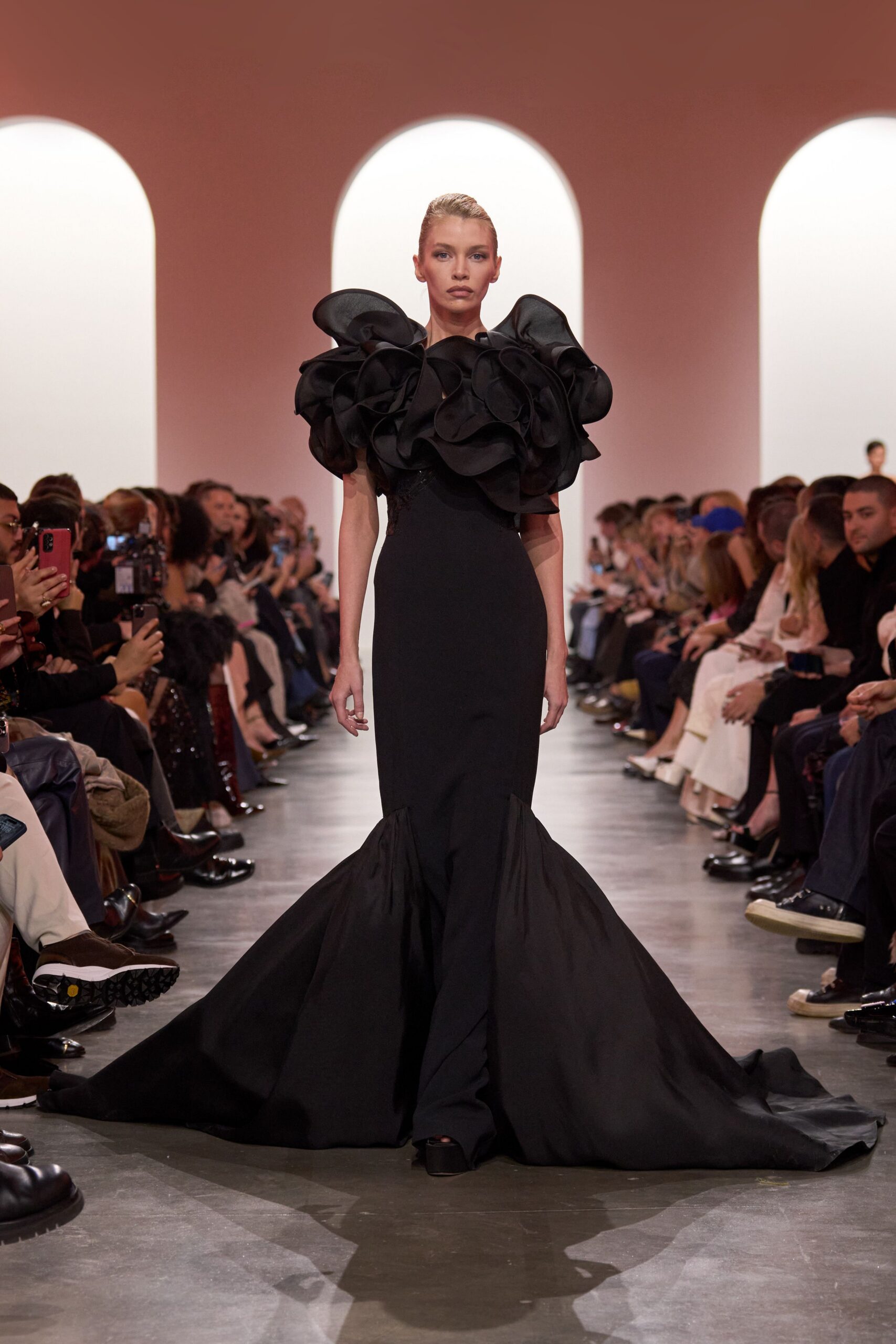 black silk short-sleeve high-neck fitted ruffled flared gown