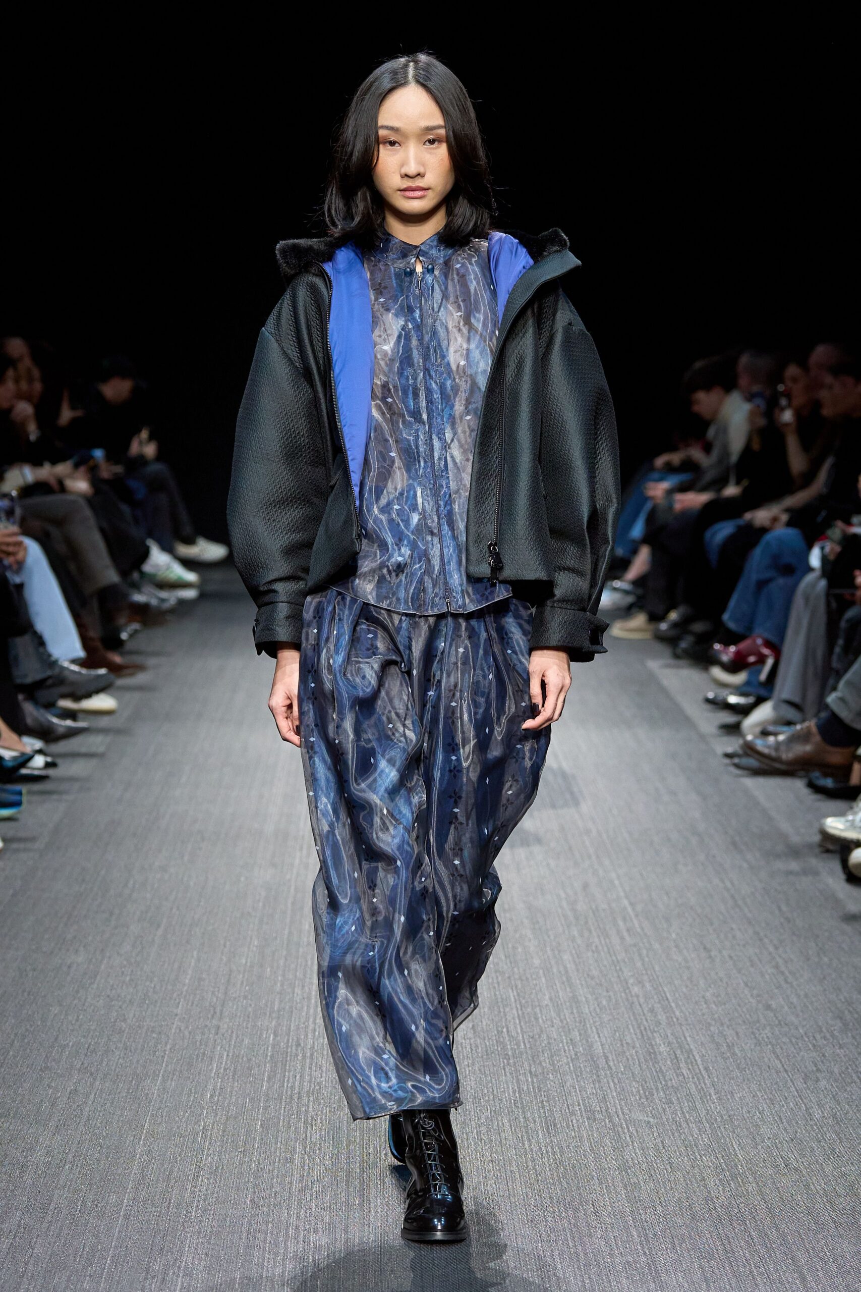 black neoprene jacket with blue top