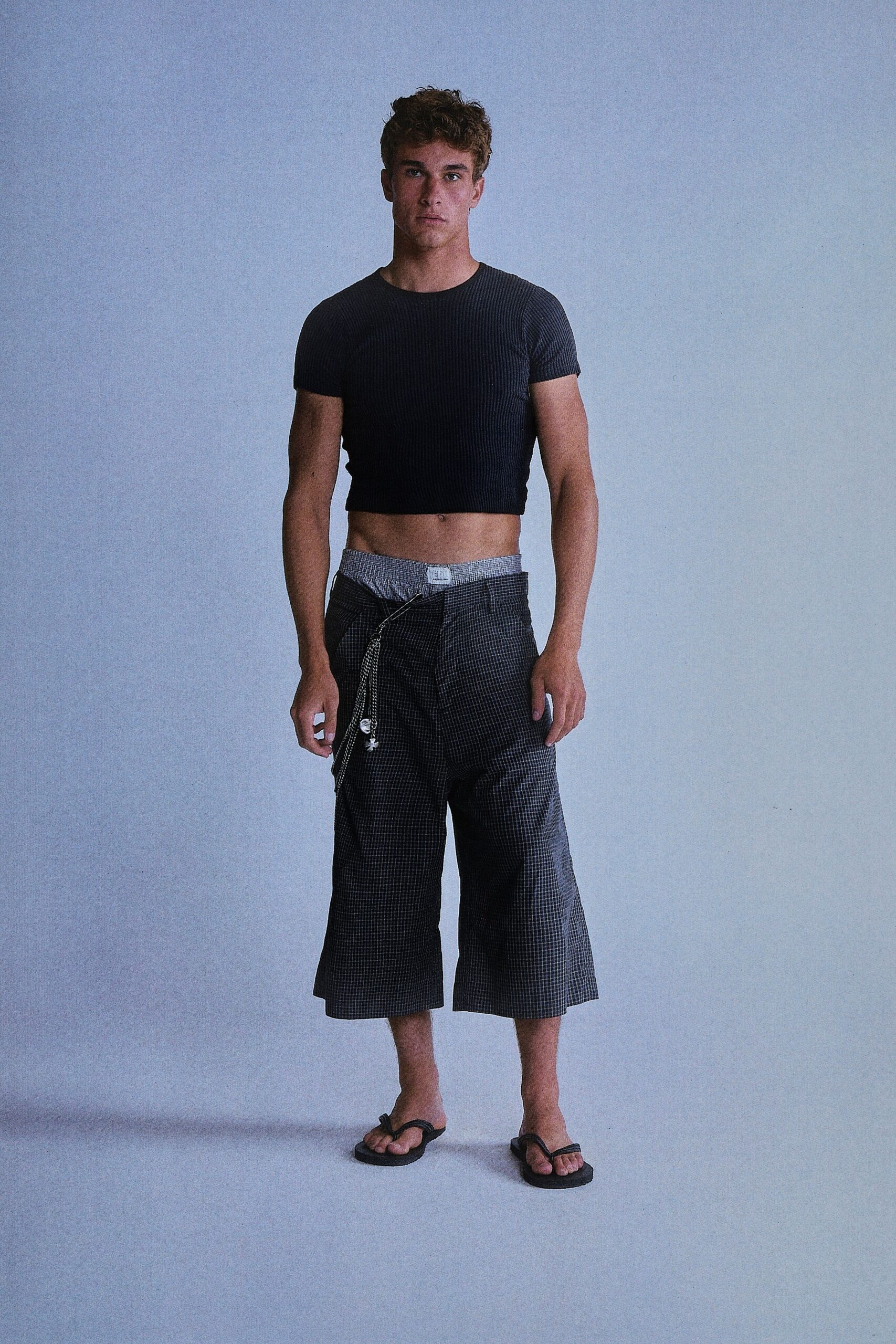 black crop-top gray wide-leg pants