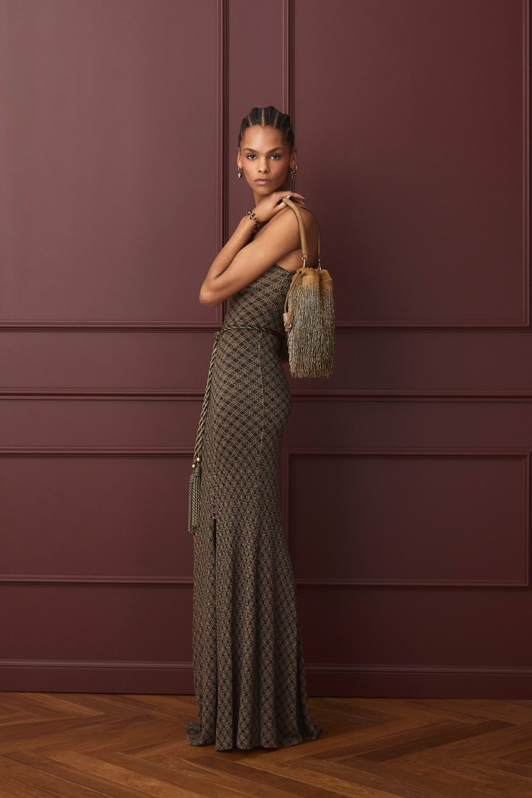 brown silk sleeveless v-neck fitted flared printed gown
