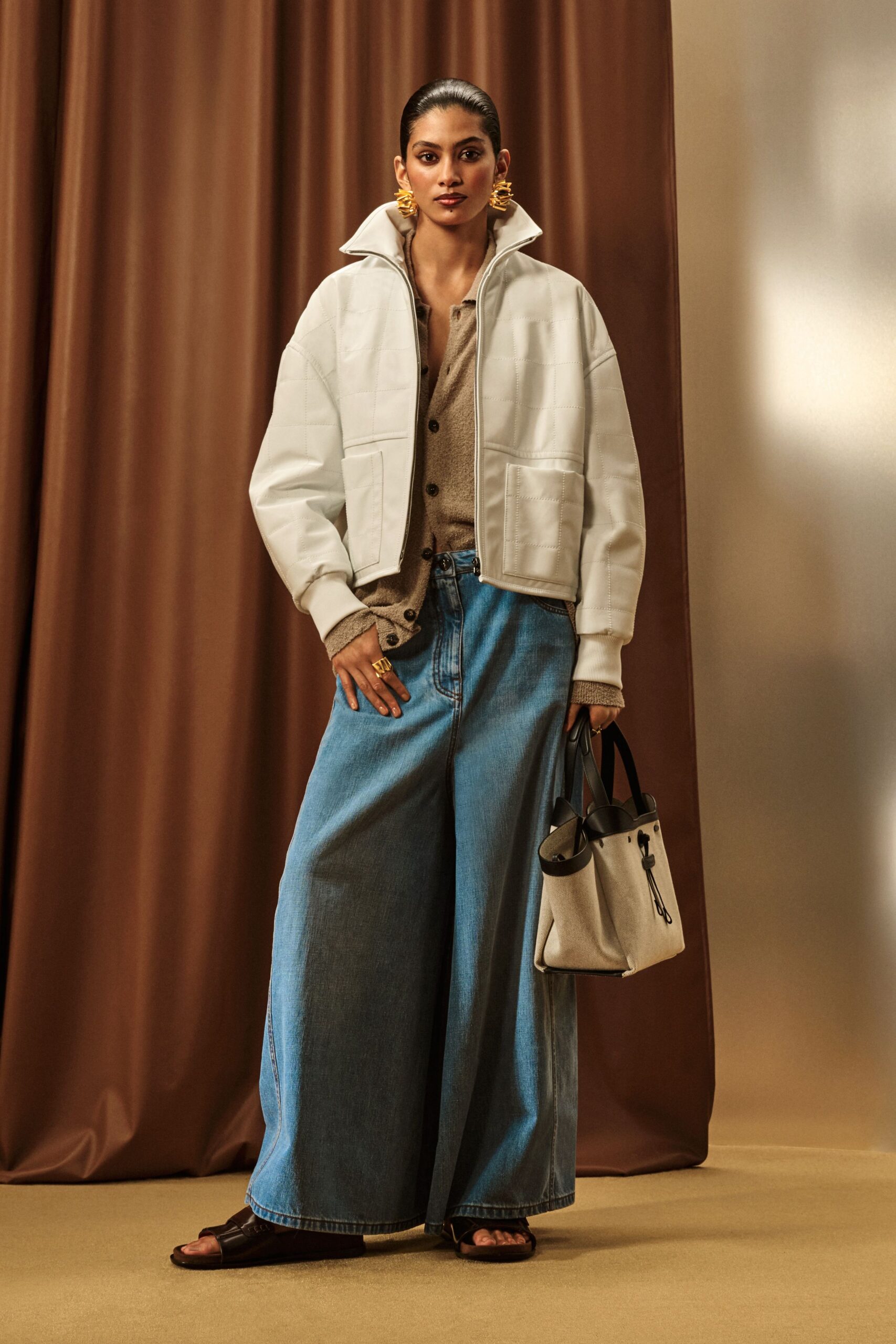 white leather long-sleeve collared oversized jacket