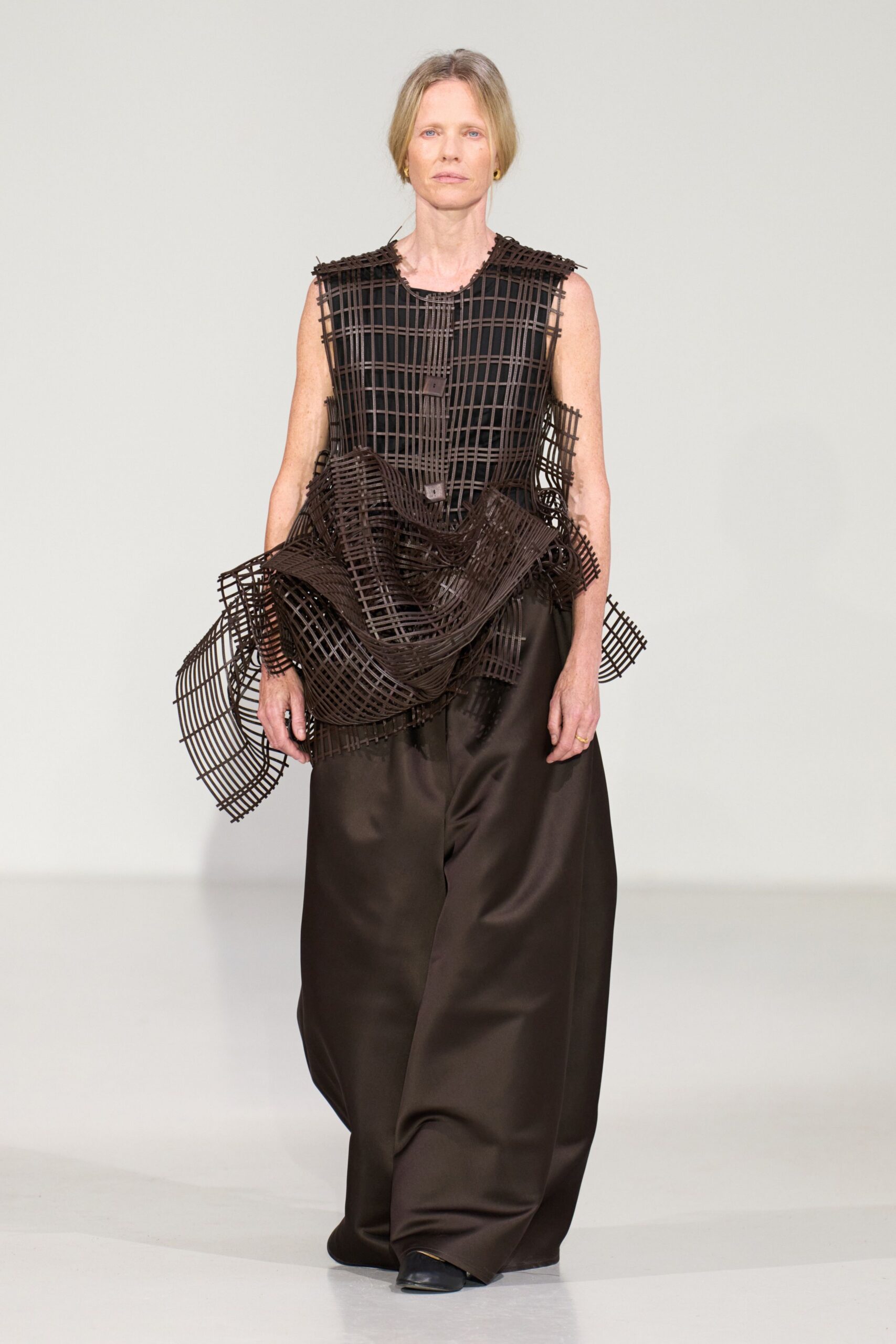 brown layered top and wide-leg pants