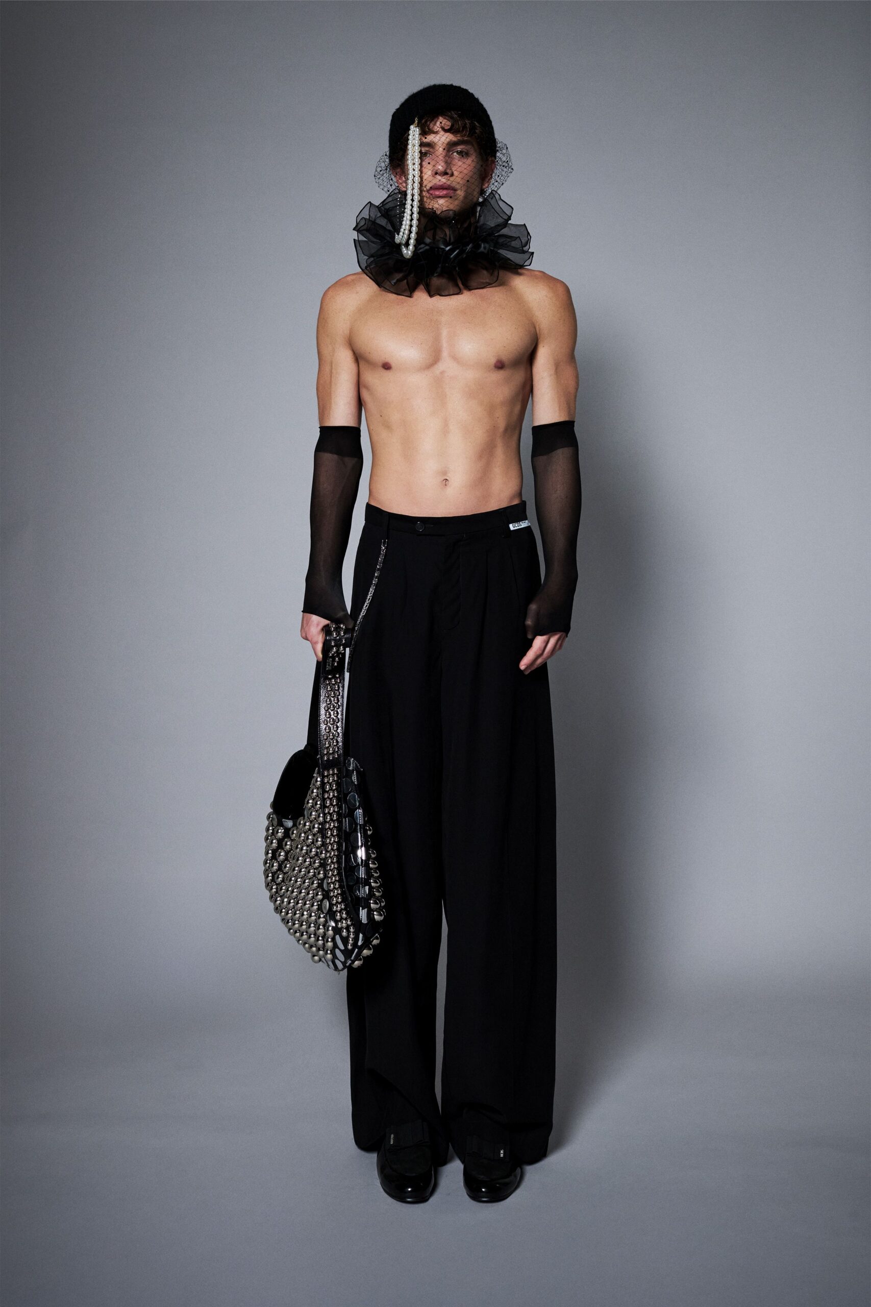 black relaxed pants with accessories