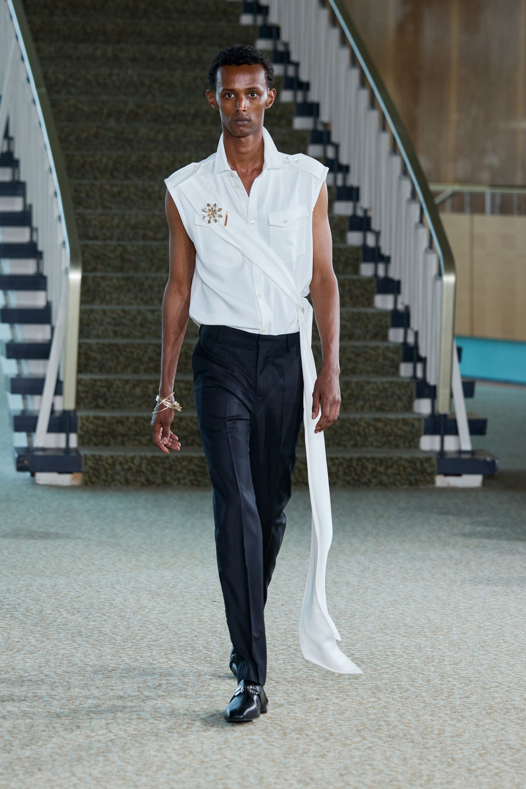 white cotton sleeveless v-neck fitted embroidered shirt