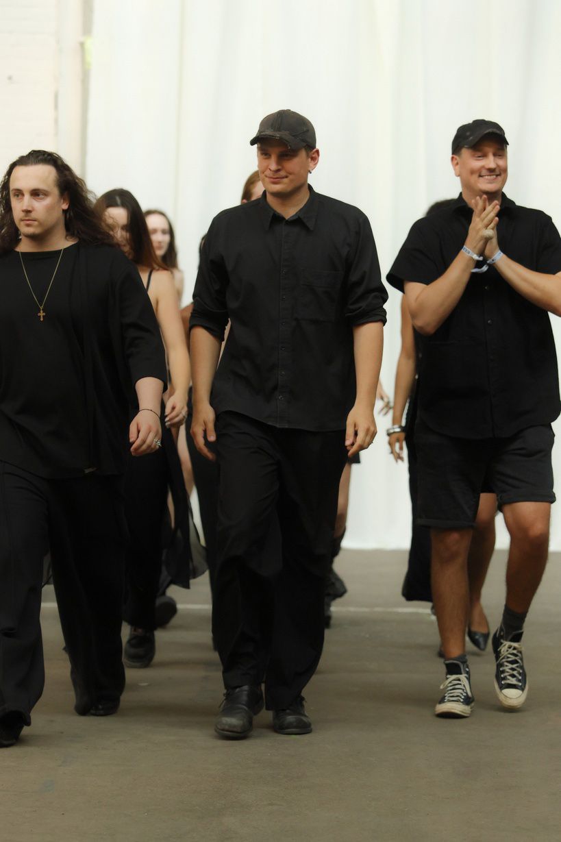 black fitted shirt and pants