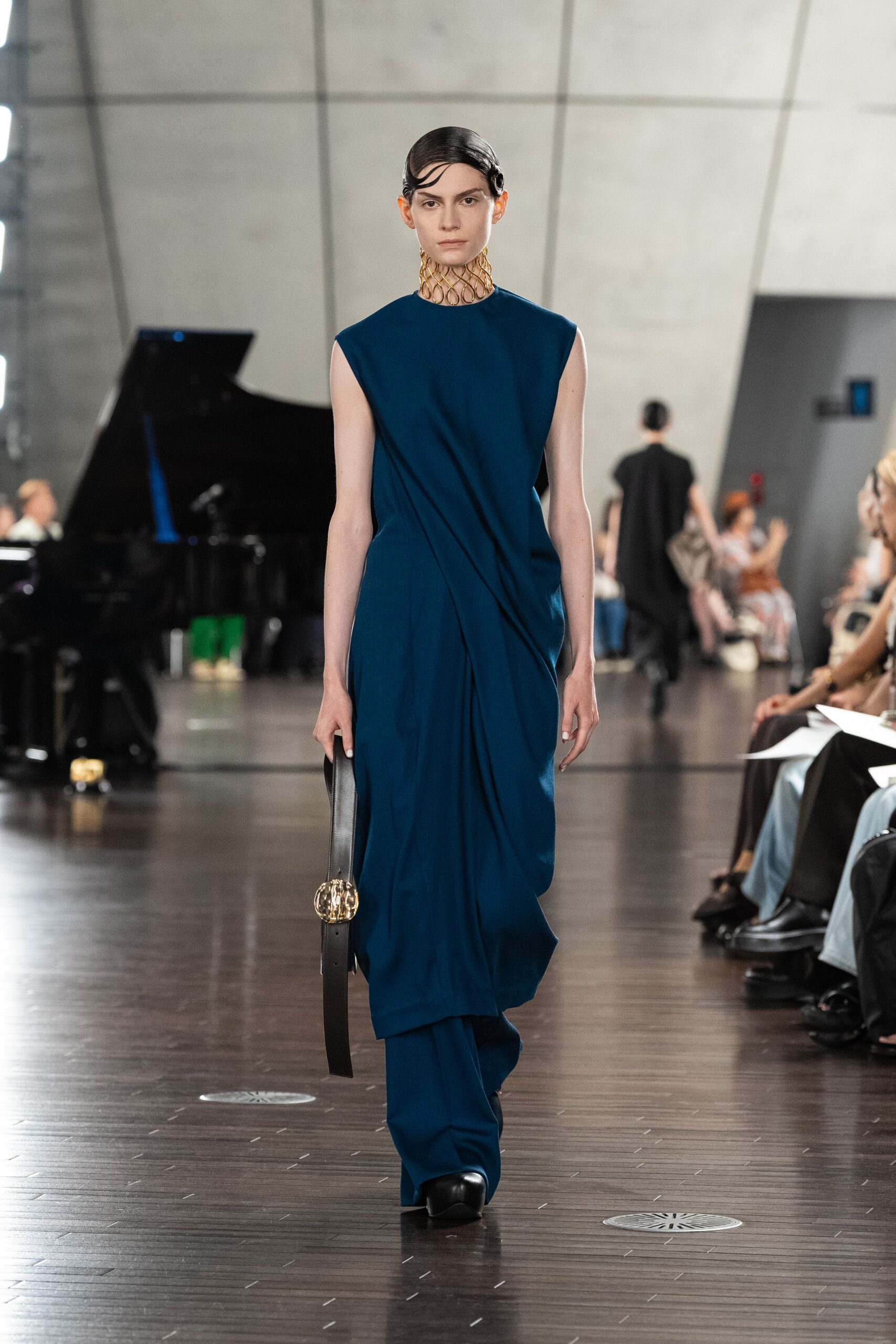 blue silk sleeveless v-neck fitted draped flowing gown
