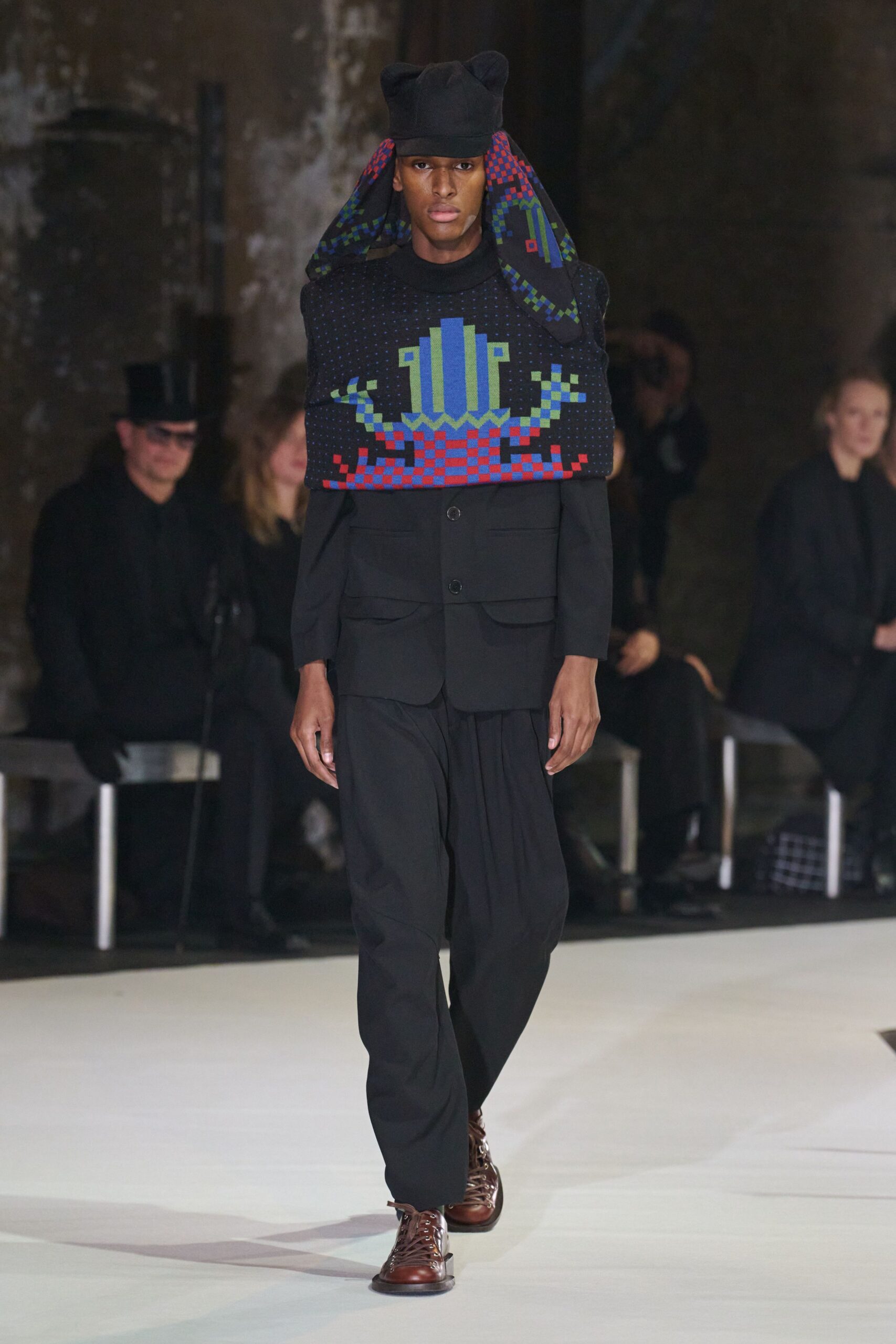 black relaxed suit with hat