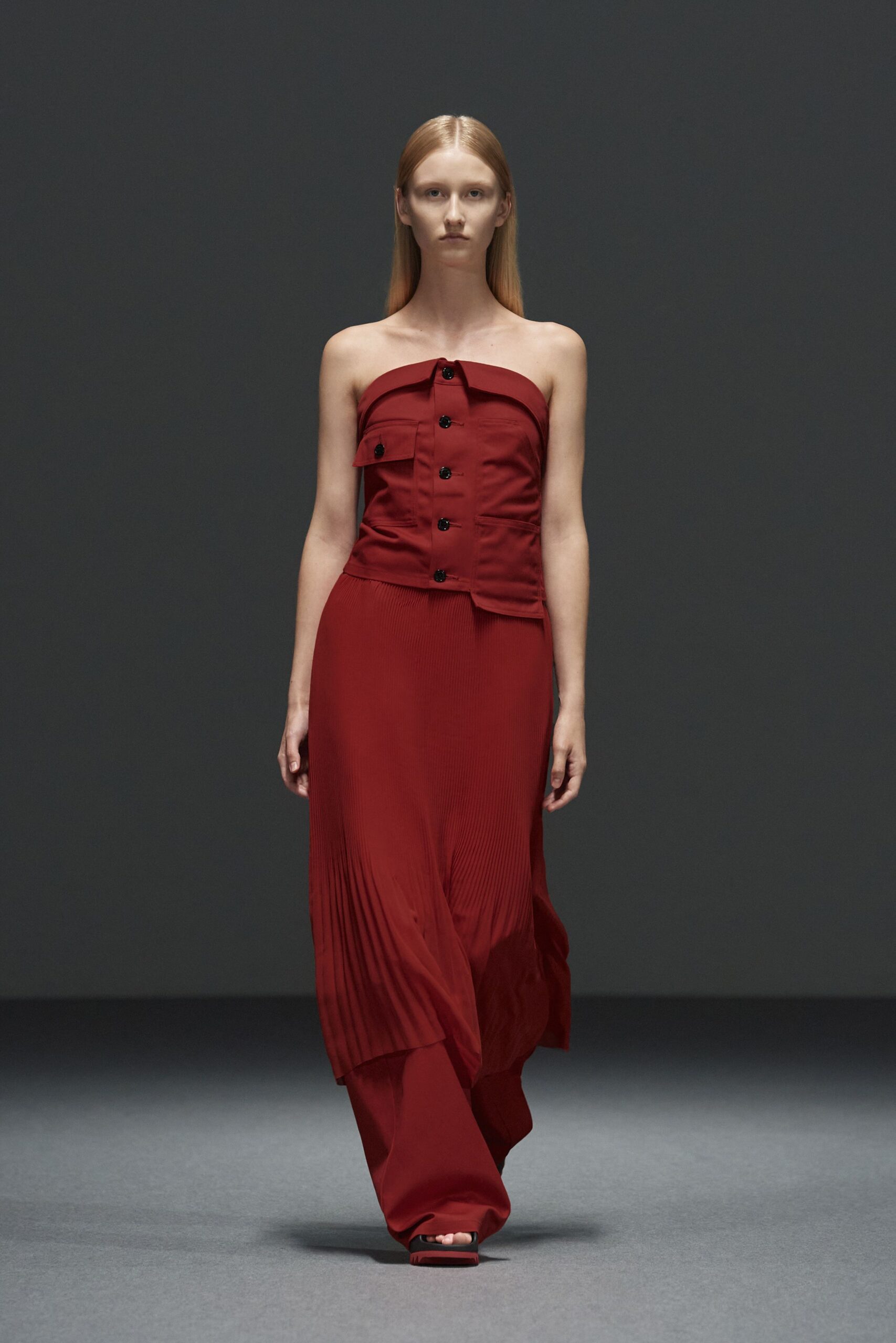 red strapless pleated maxi dress