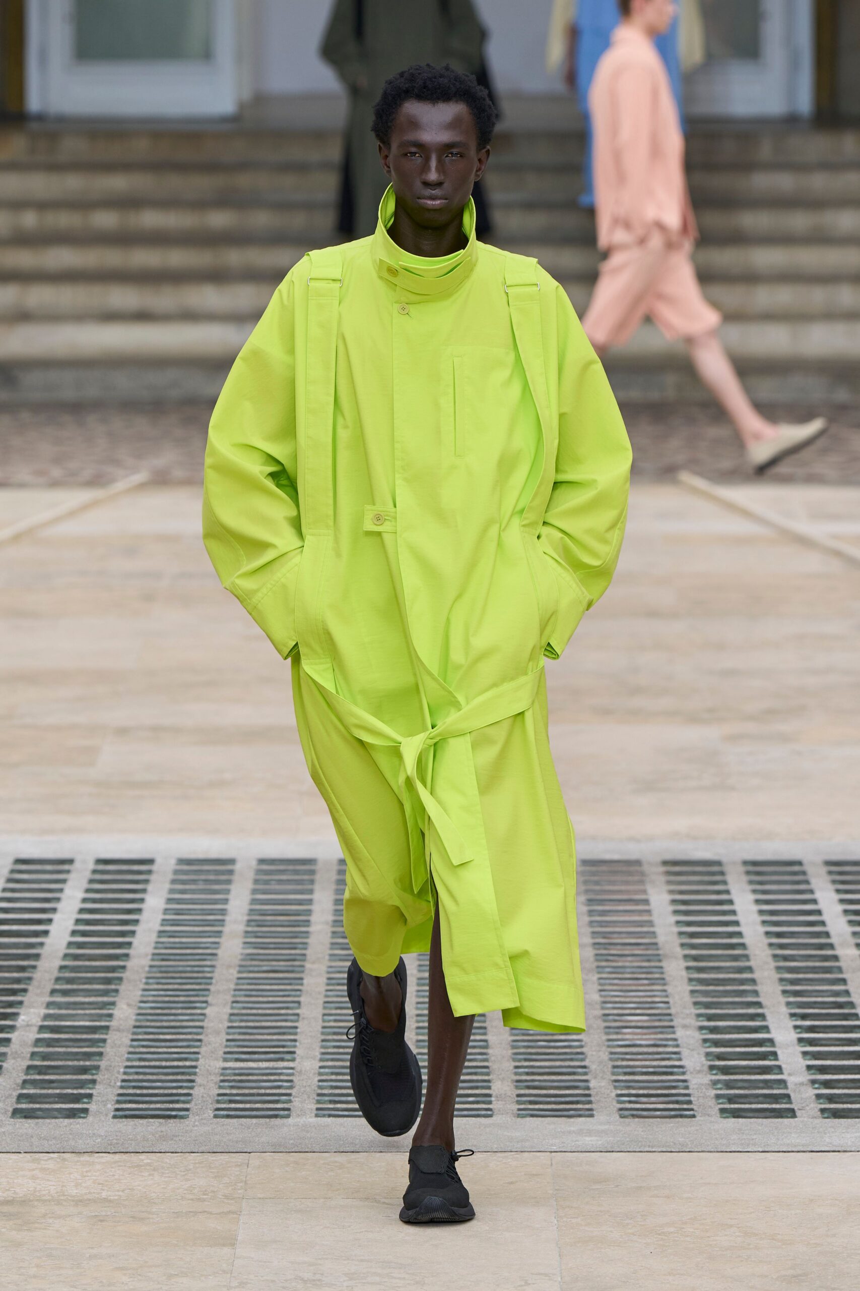 neon green relaxed coat with black shoes