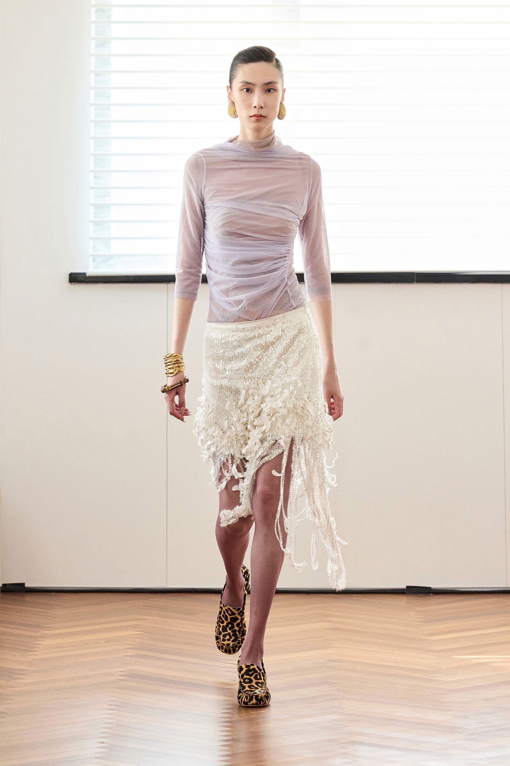 purple fitted top with fringed skirt
