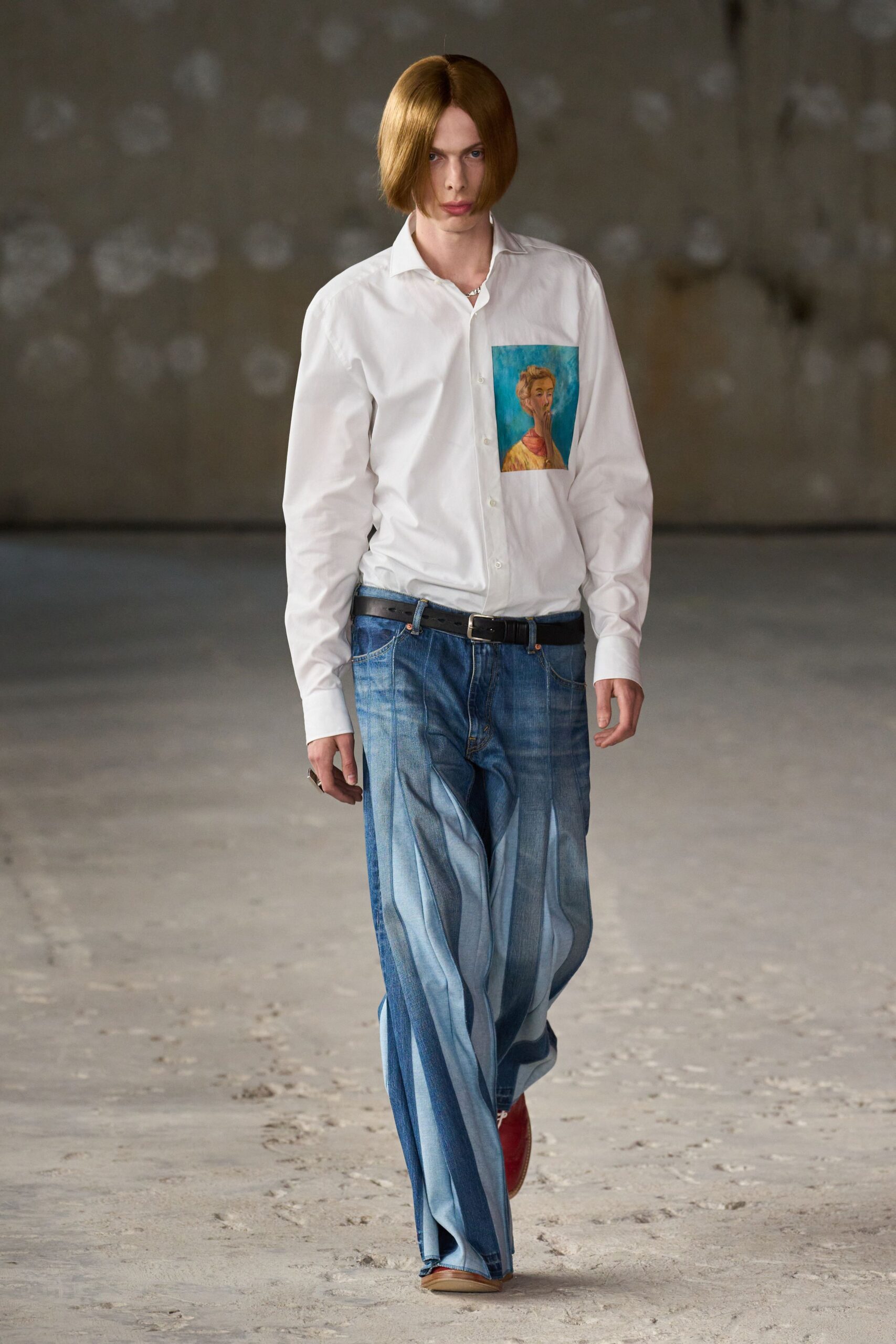 white shirt blue pleated pants